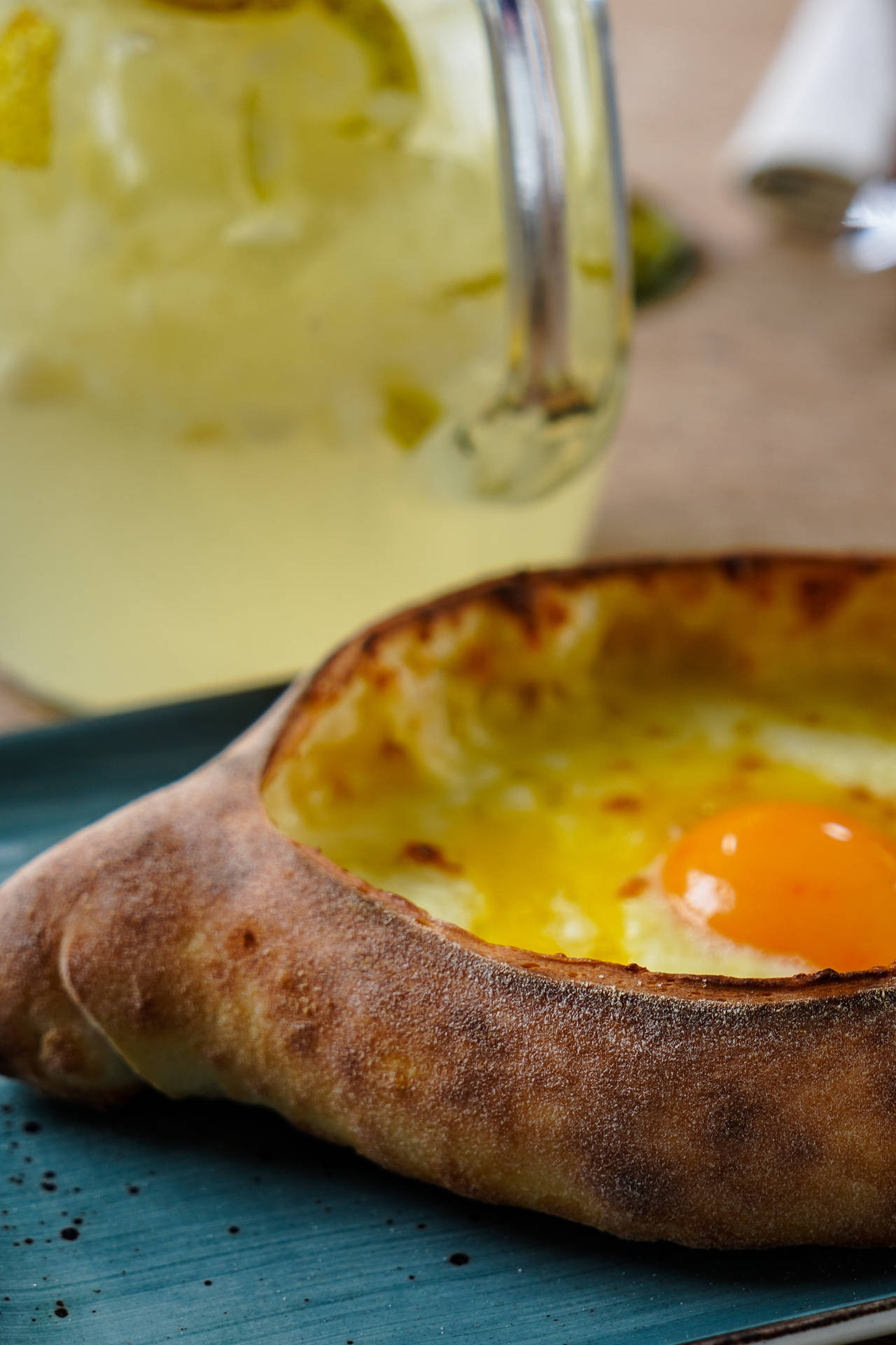 Mouth-watering Georgian Khachapuri Feast Background