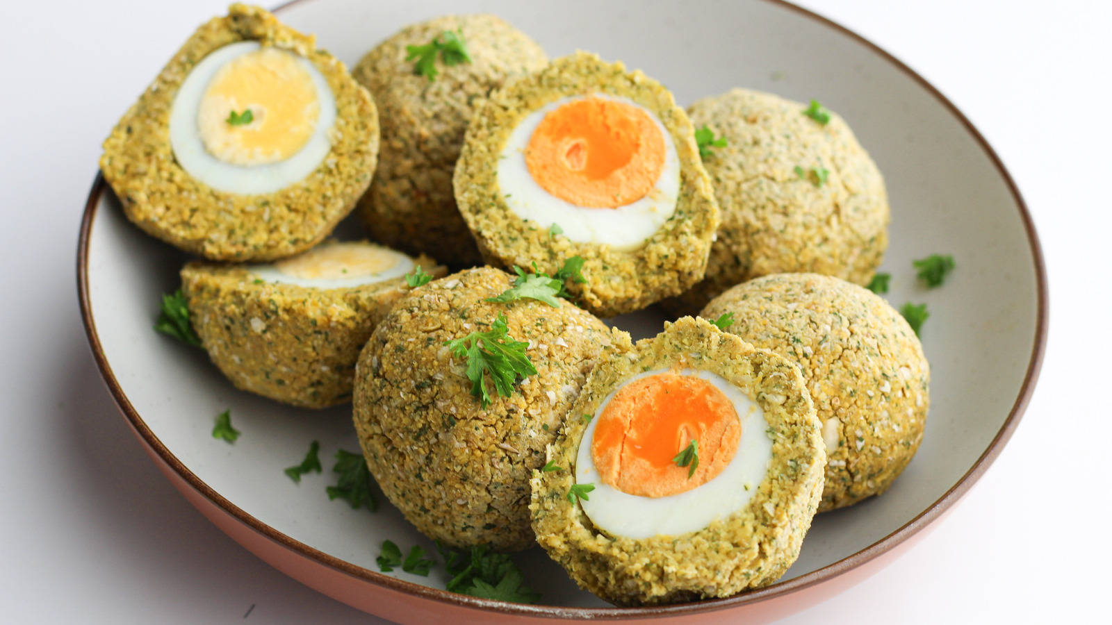 Mouth-watering Traditional British Scotch Eggs Garnished With Herbs Background