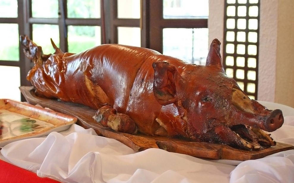 Mouth-watering Whole Lechon Feast Background