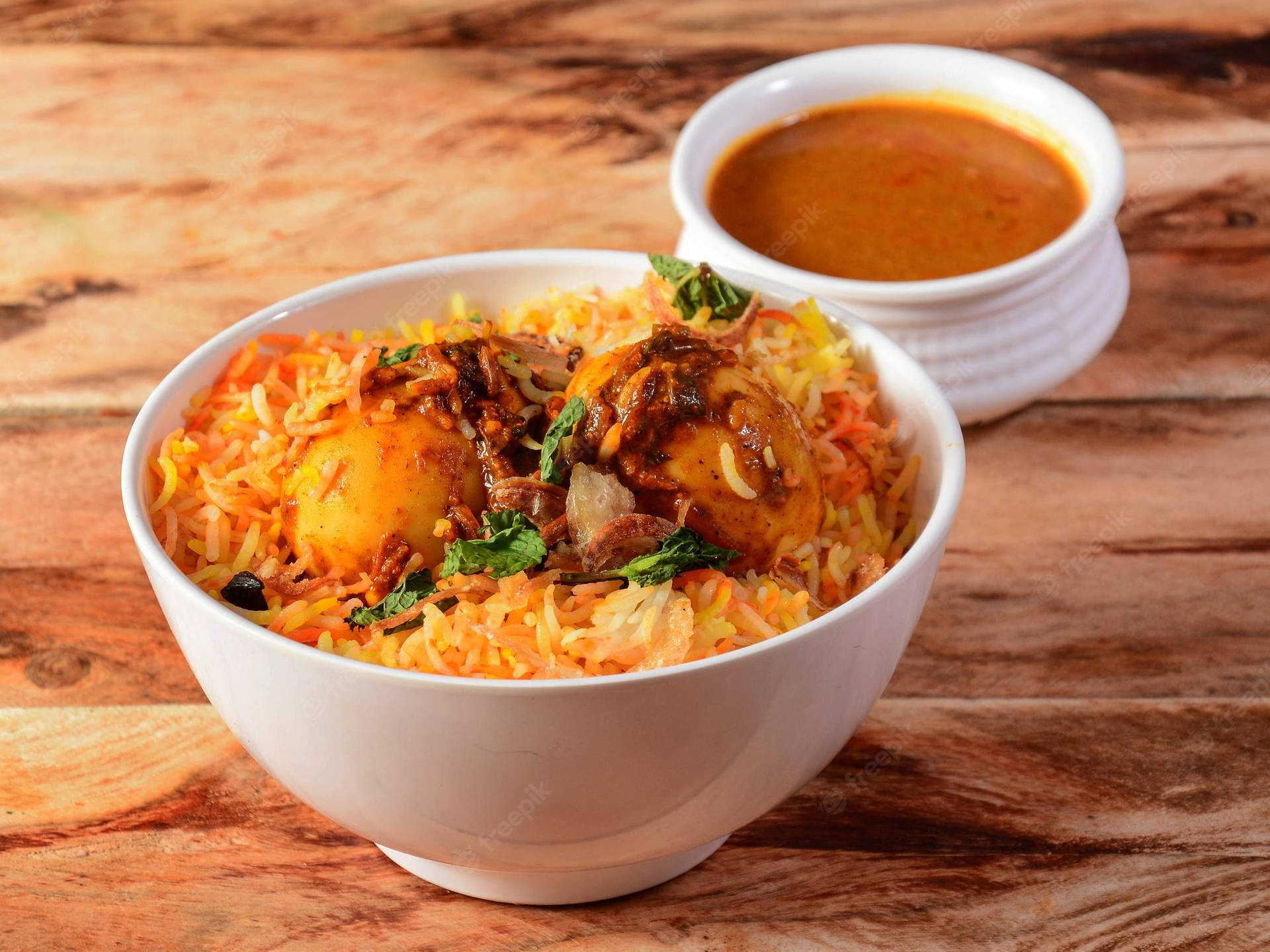 Mouthwatering Biryani In White Bowl