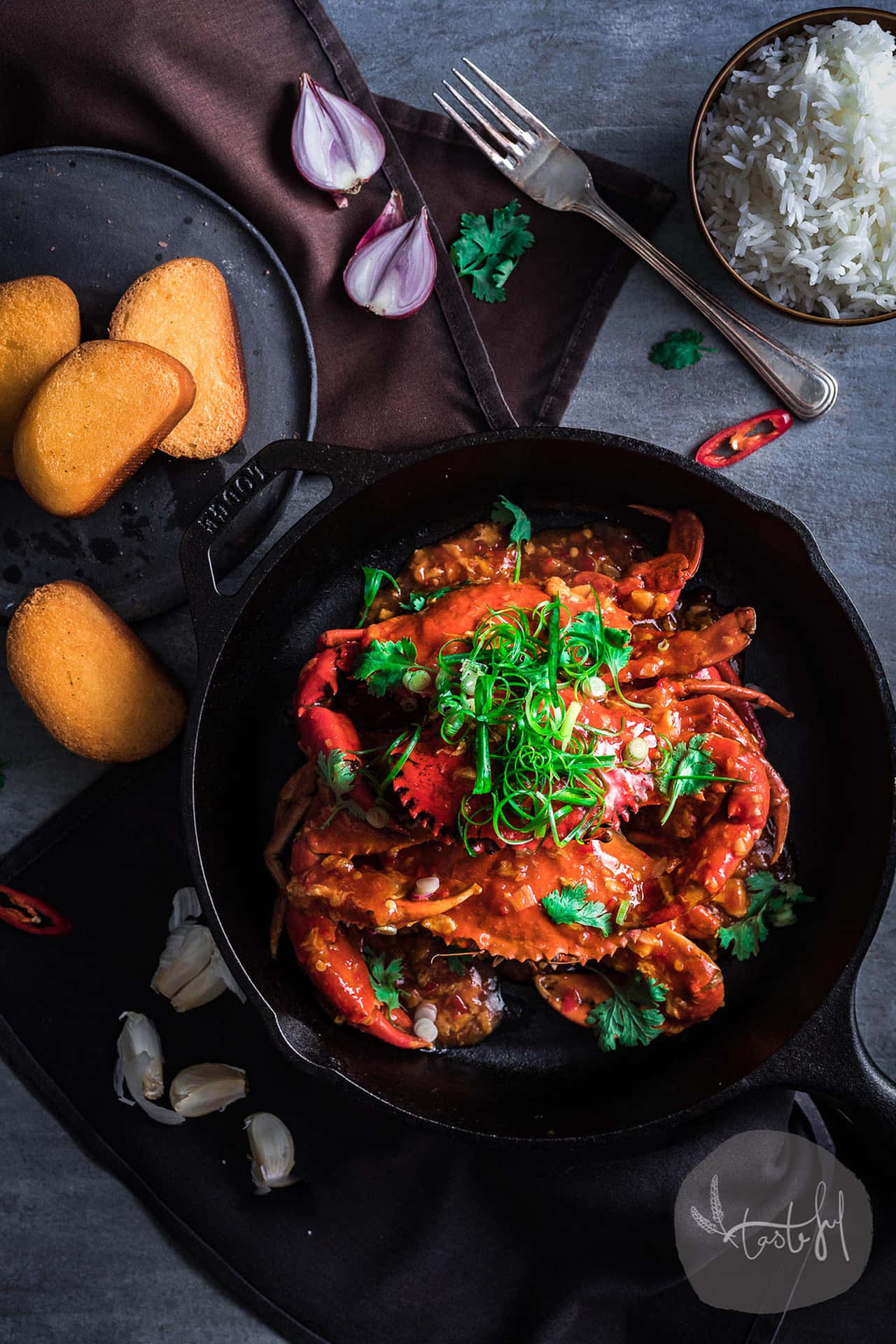 Mouthwatering Chilli Crab Adorned With Potato Slices Background