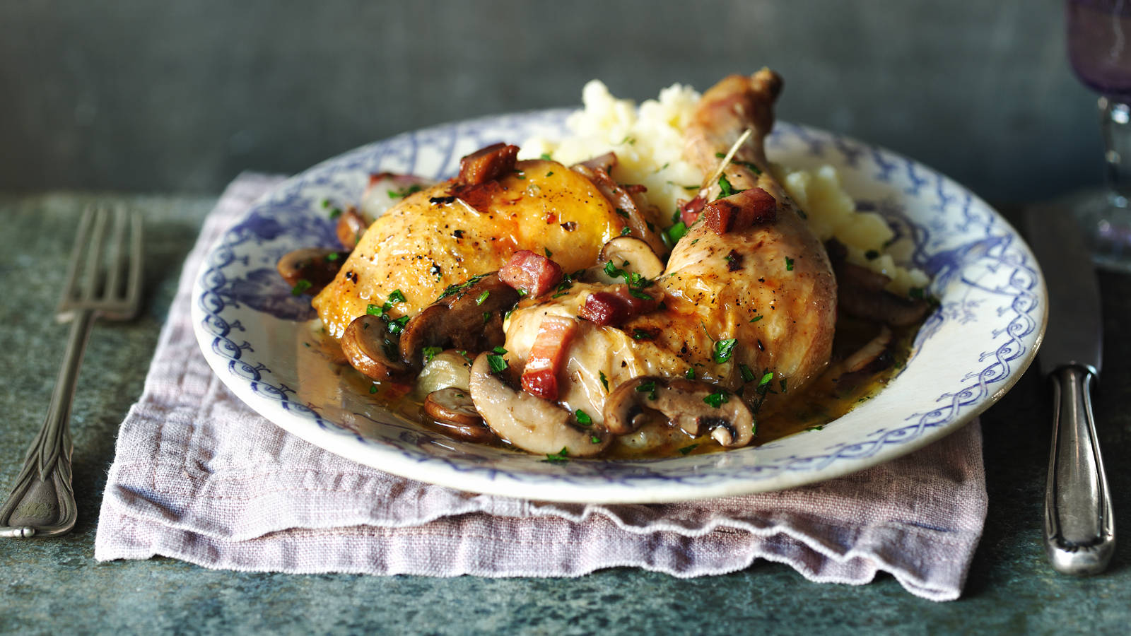 Mouthwatering Coq Au Vin On A Ceramic Plate Background