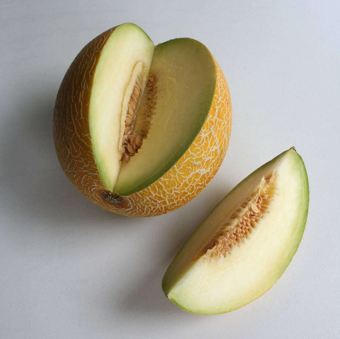 Mouthwatering Slices Of Honeydew Melon Background