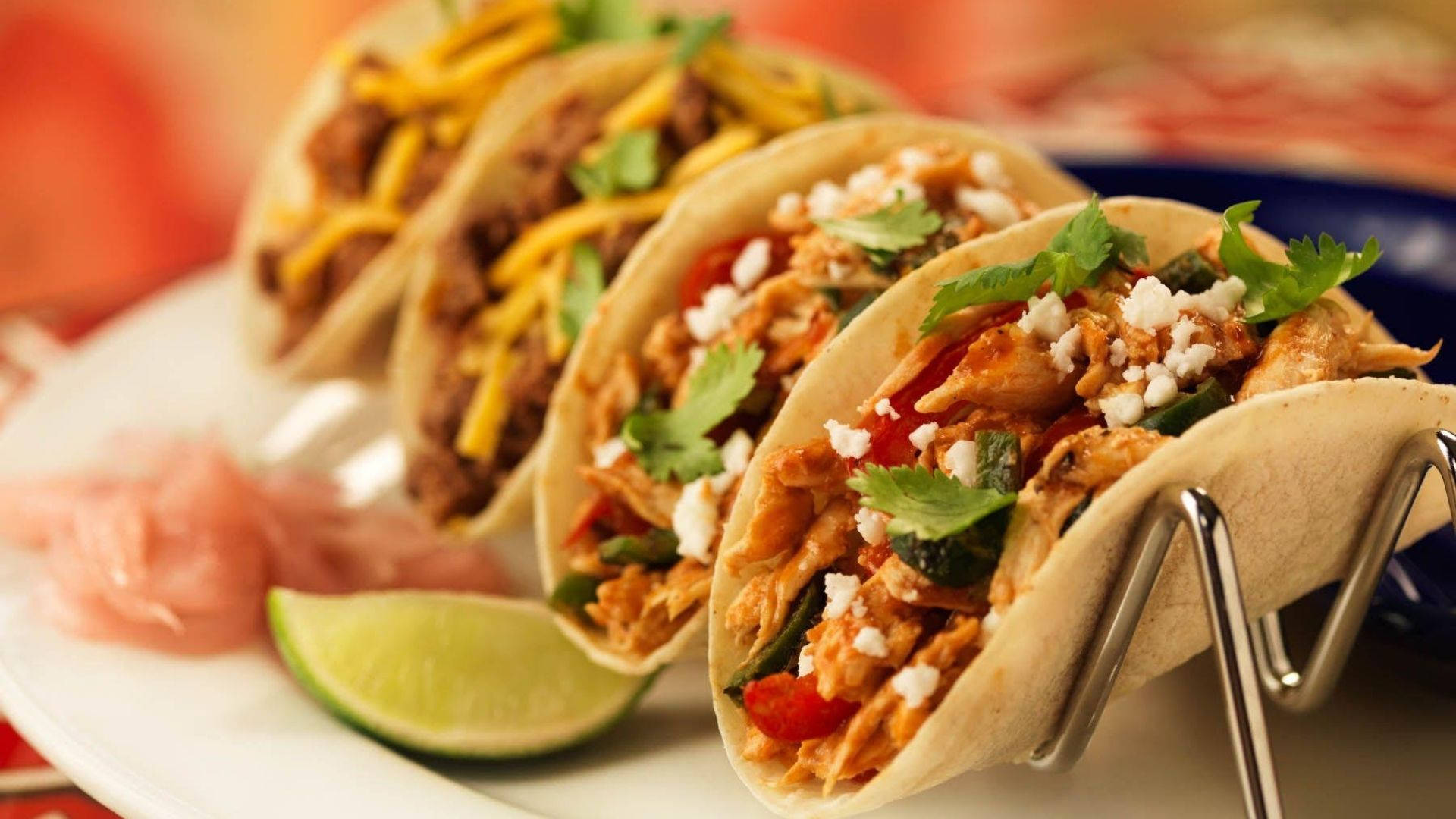 Mouthwatering Tacos On A Rack Stand Background