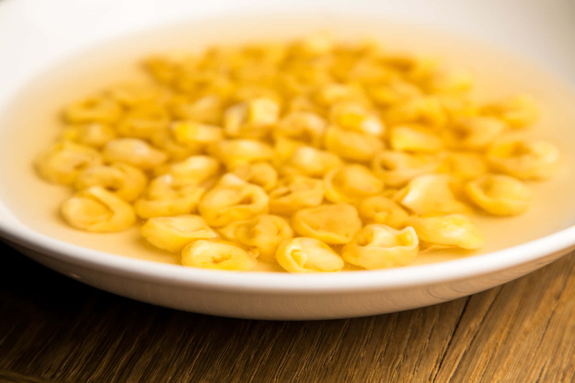 Mouthwatering Tortellini In Brodo, Italian Culinary Delight Background