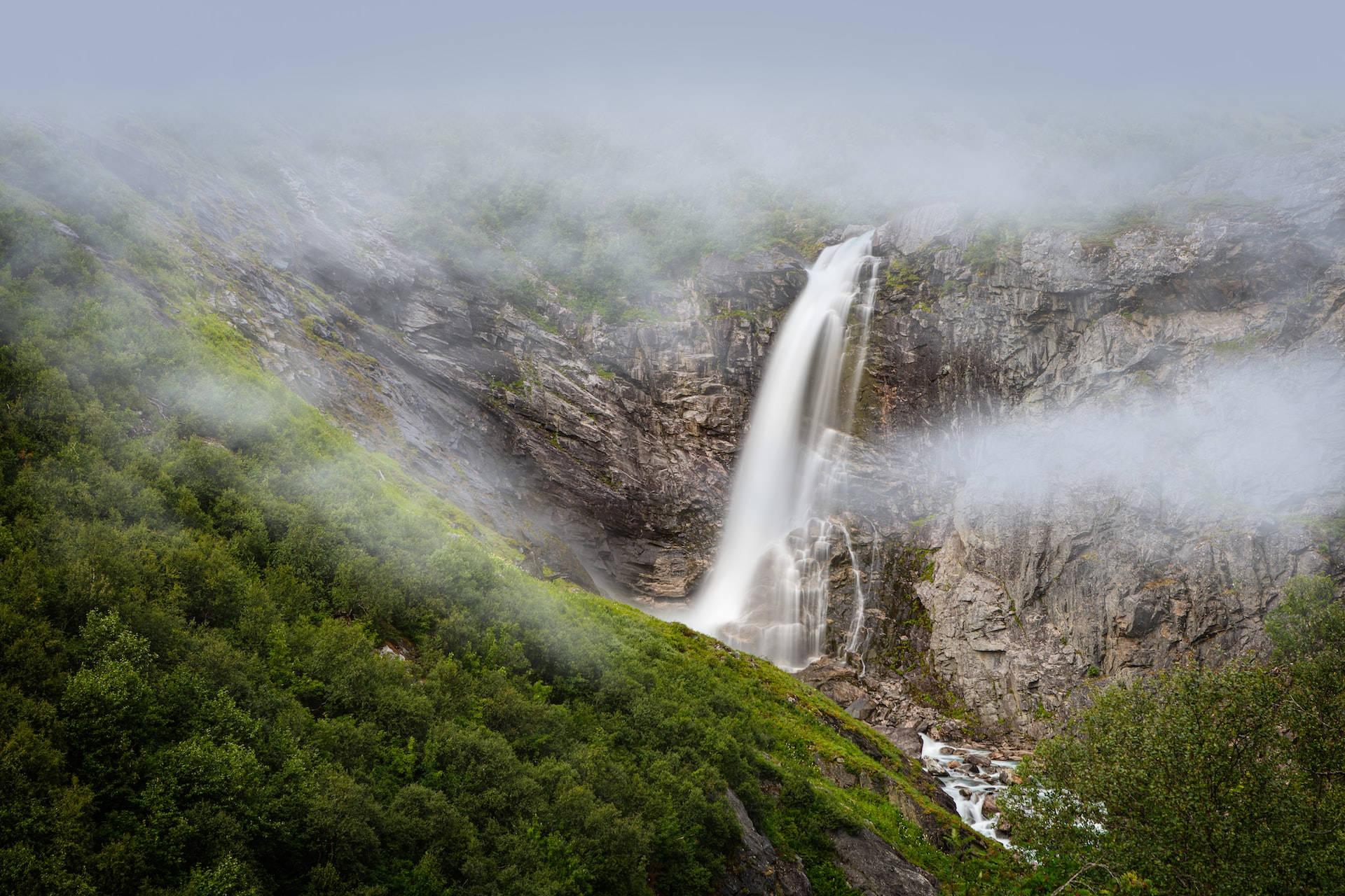 Moving Water From A Cliff Background