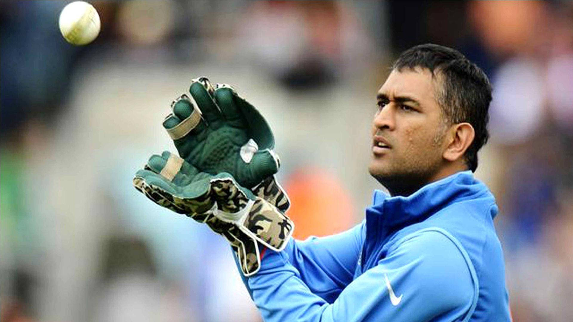Ms Dhoni Catching Cricket Ball Background