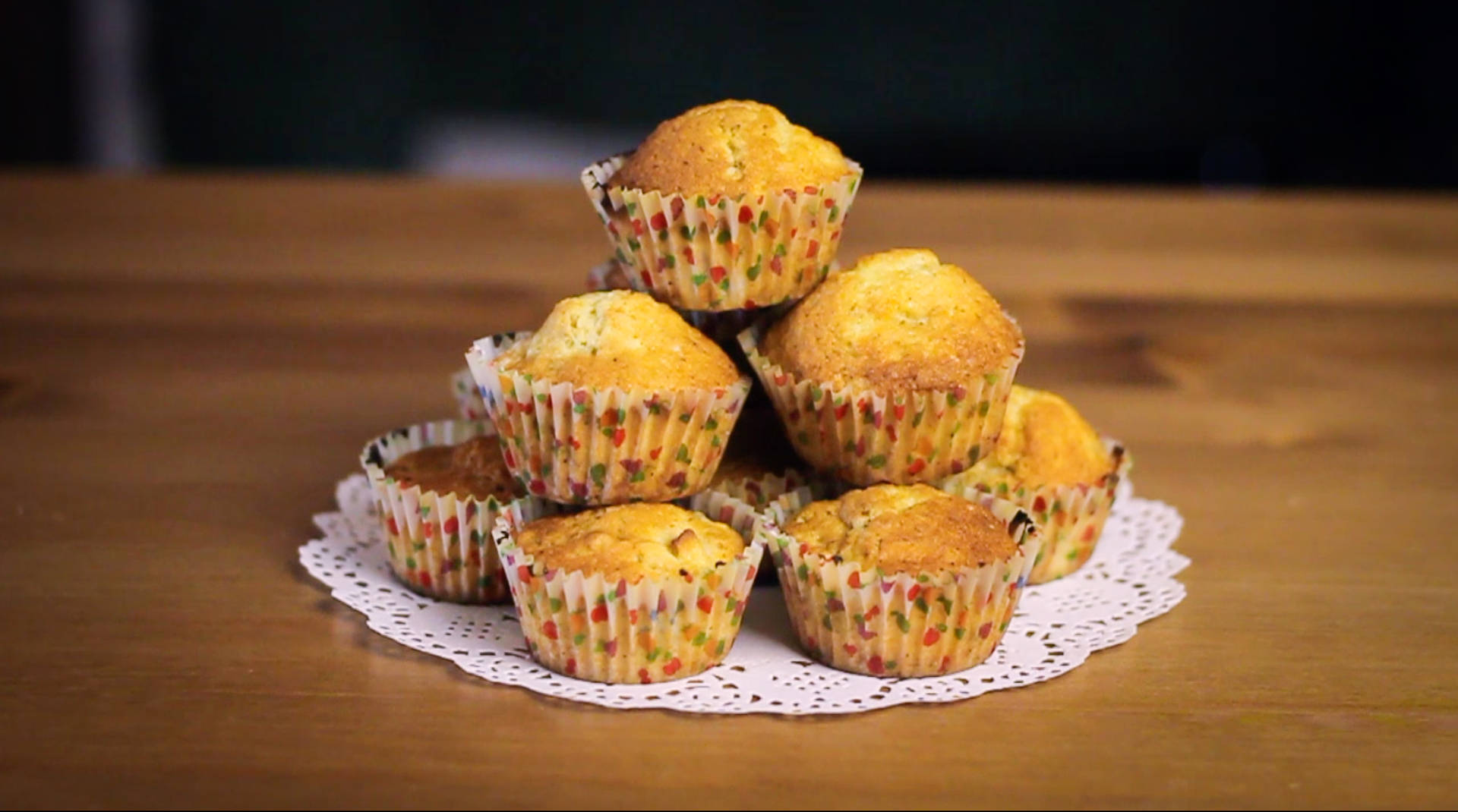 Muffin Pyramid On Table Background