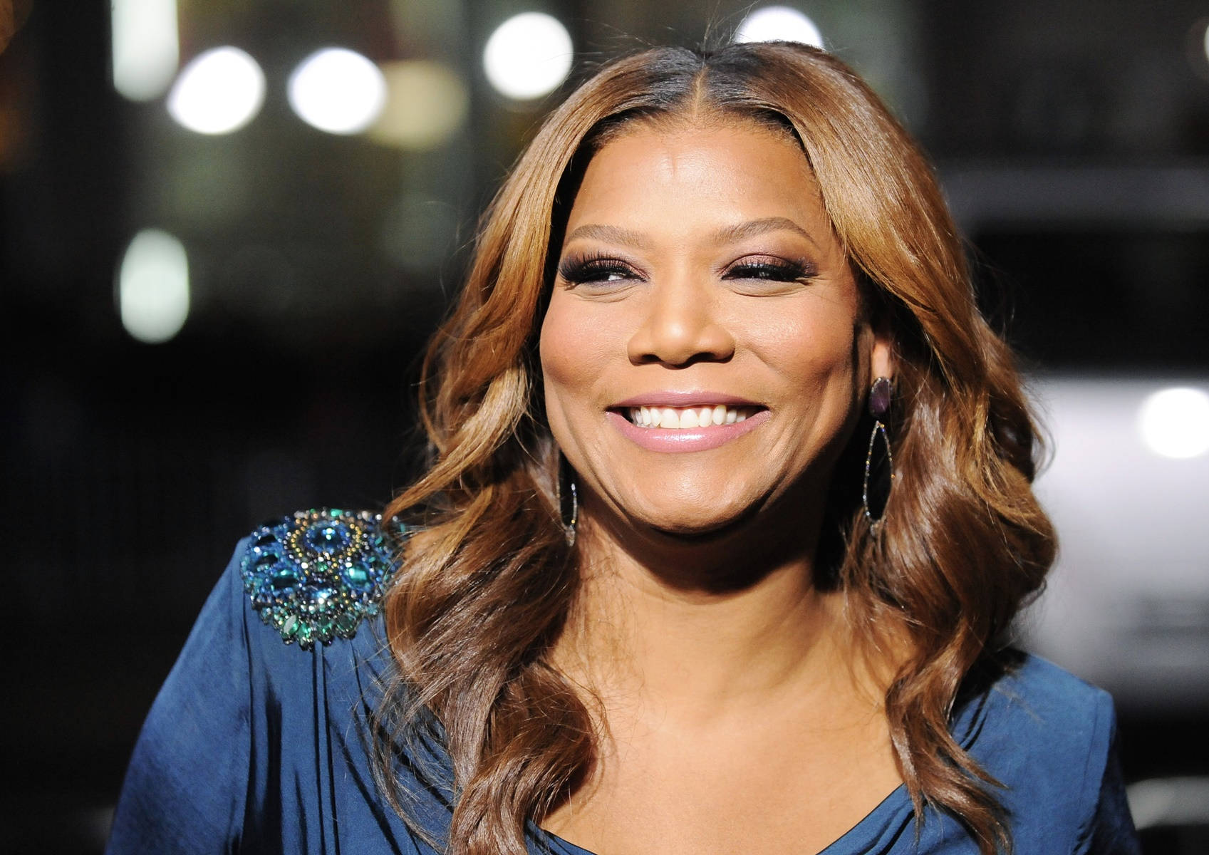 Multi-talented Star Queen Latifah Background