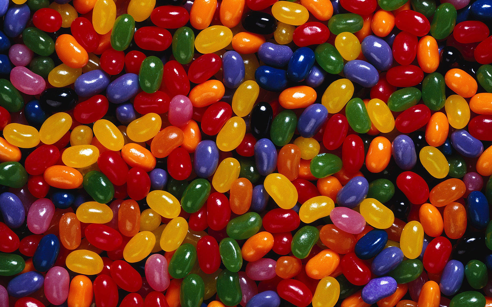 Multicolored Jellybean Candies Background