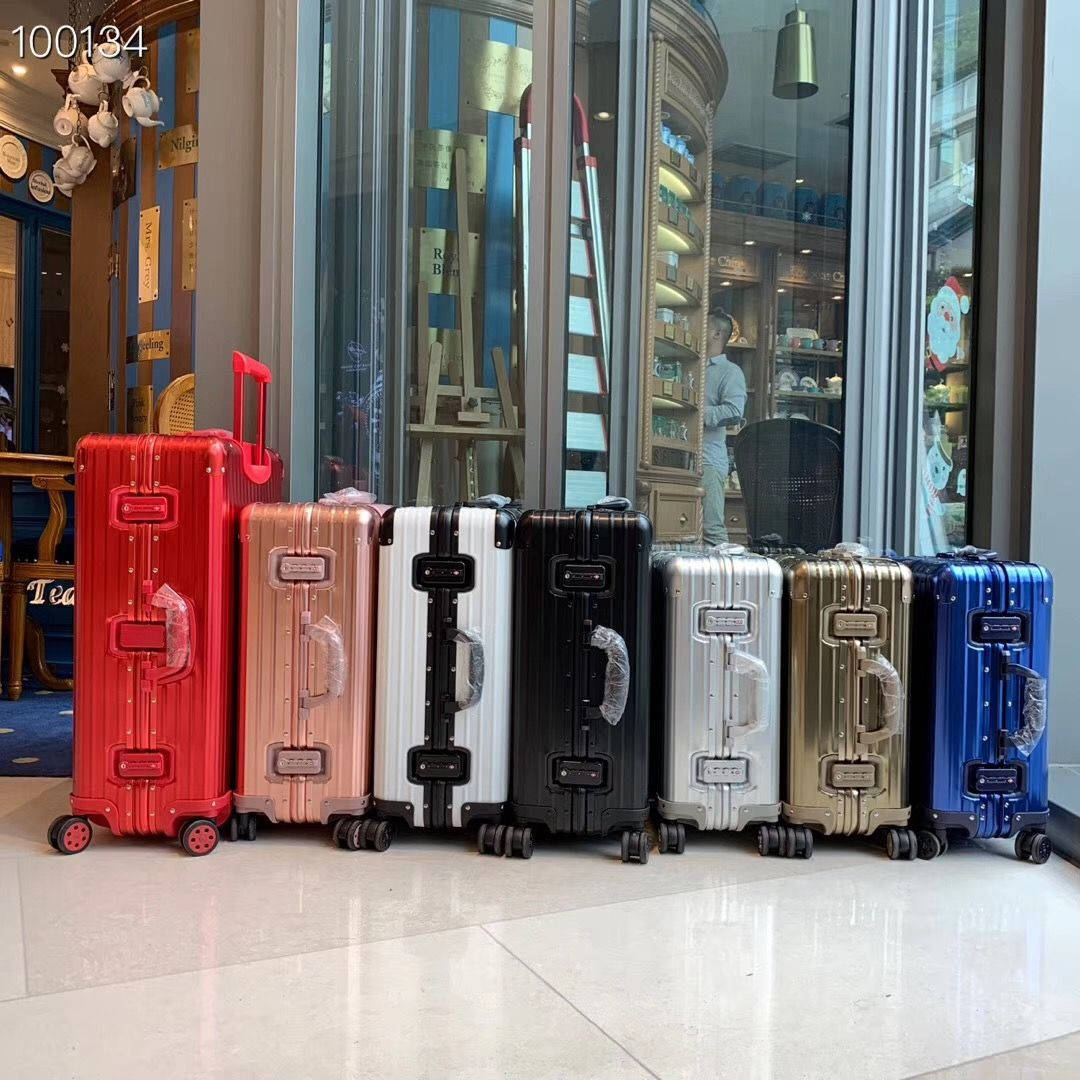 Multicolored Rimowa Suitcases