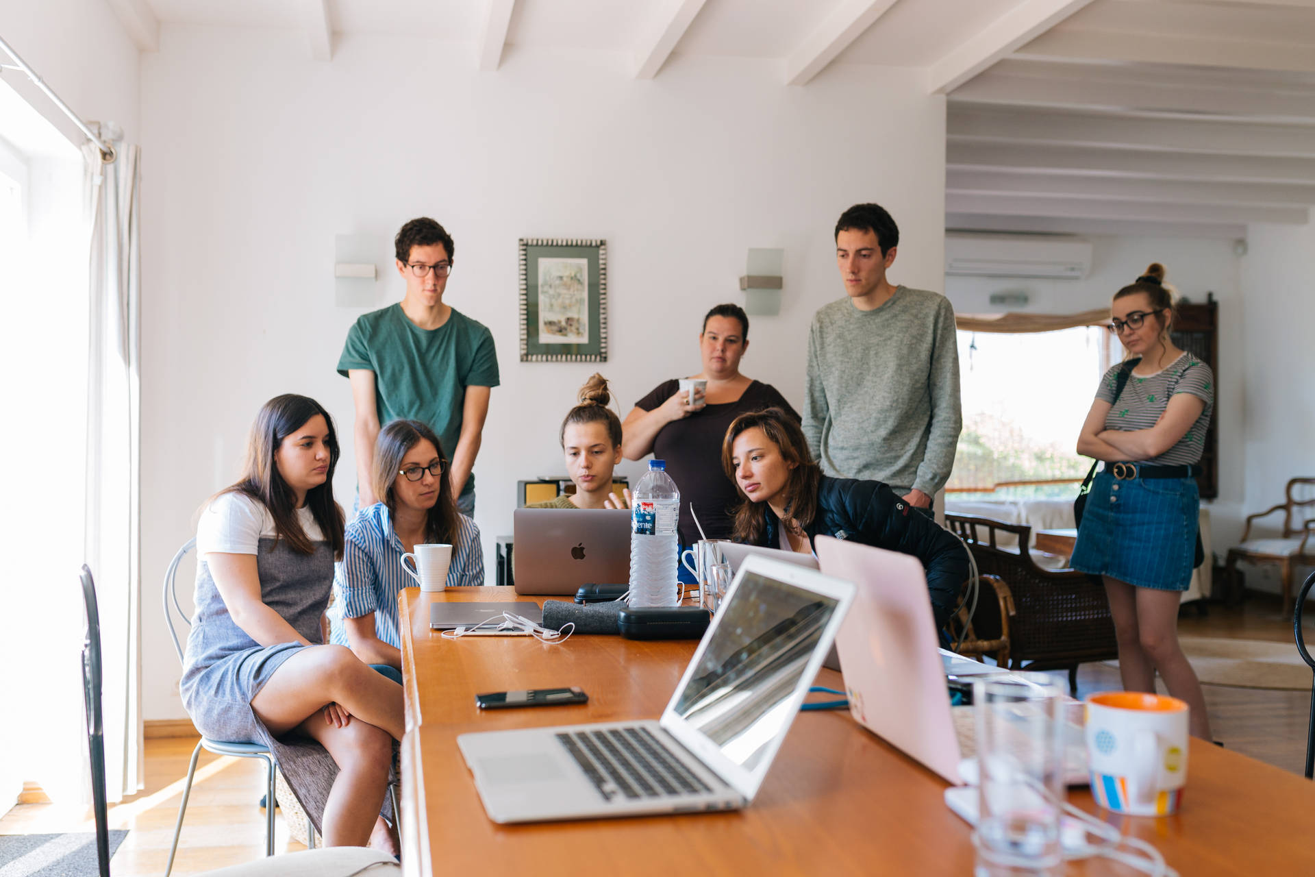 Multidisciplinary Team Collaborating At Workspace Background