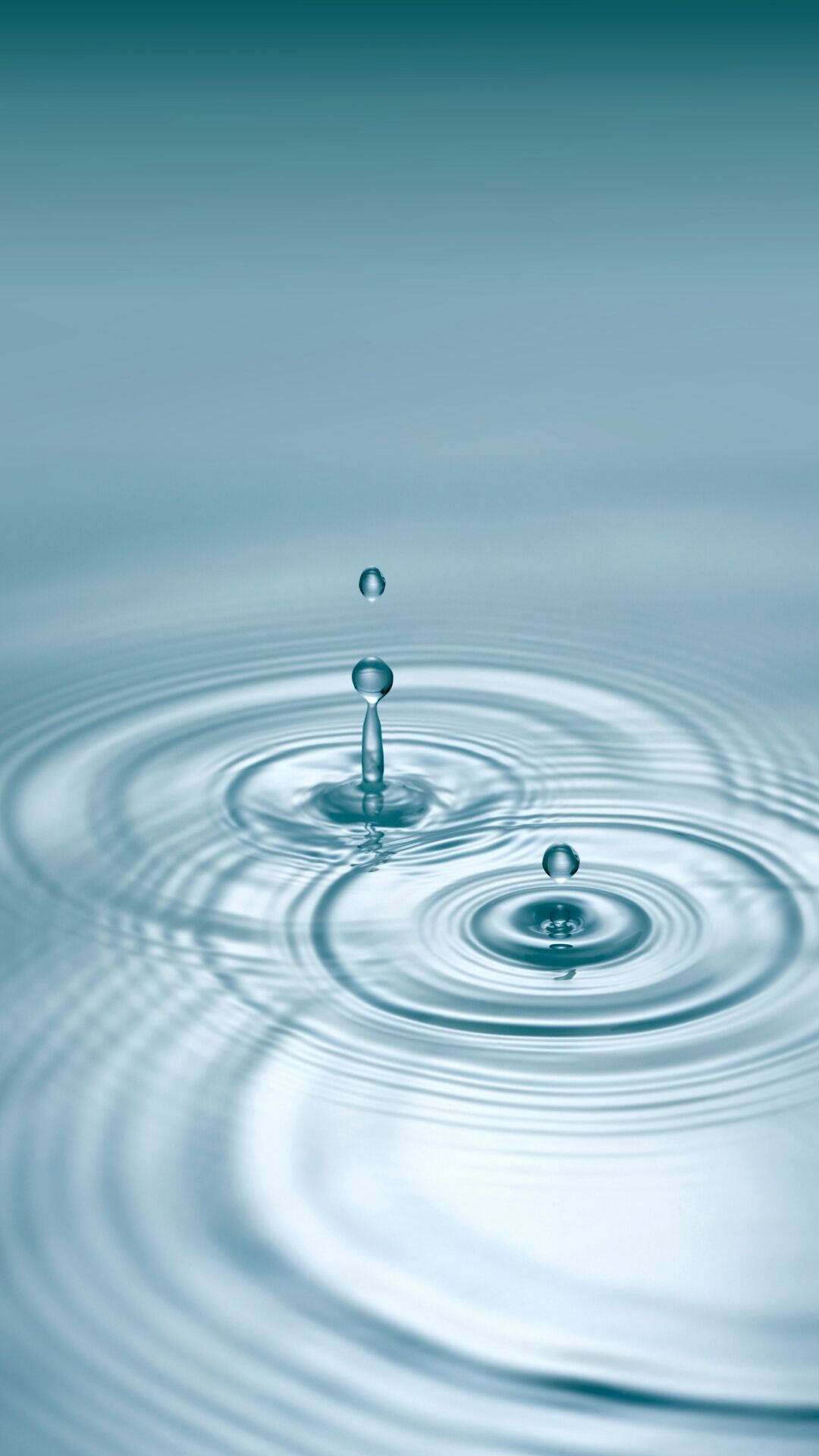 Multiple Droplets On Rippling Water Background