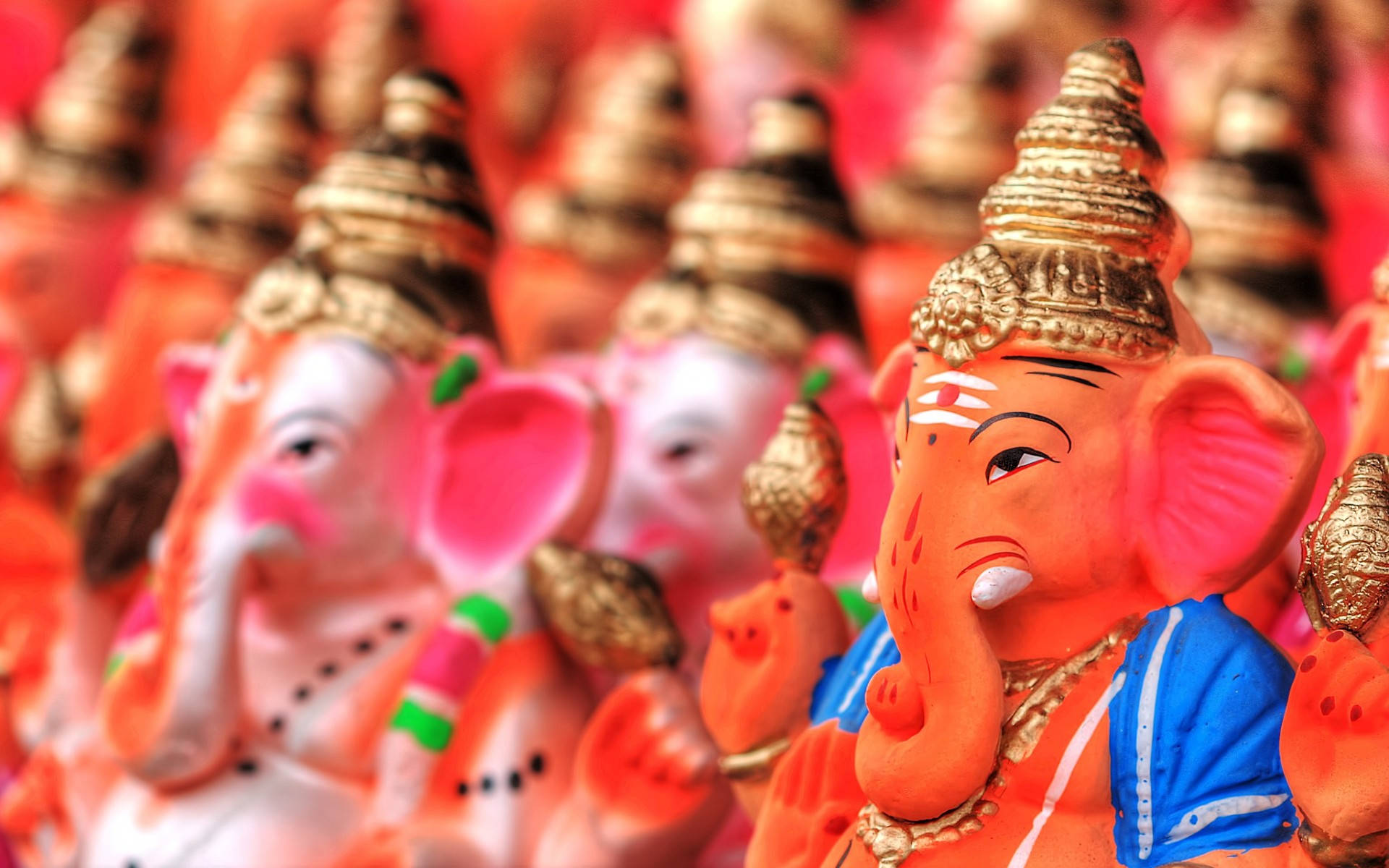 Multiple Lord Ganesha Figurines Background