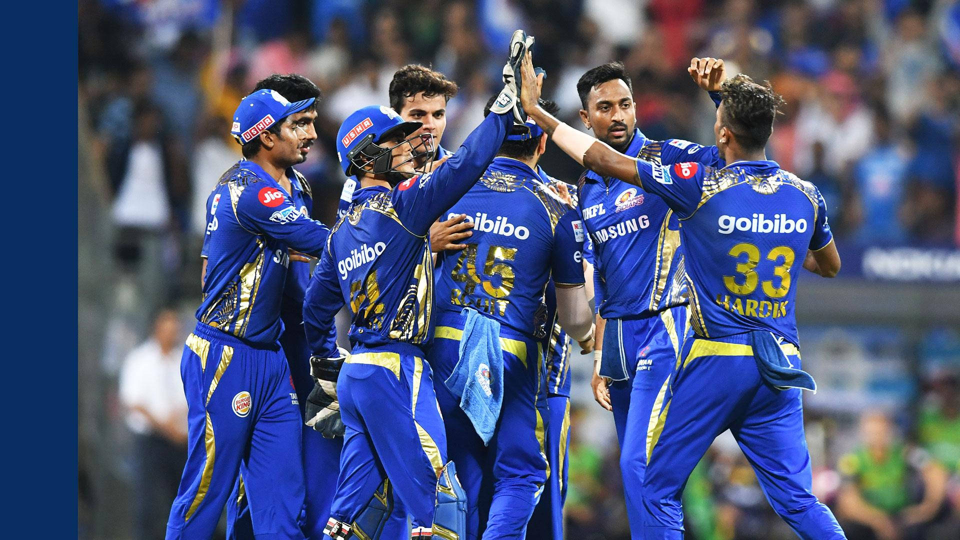 Mumbai Indians Players Huddled In Field Background