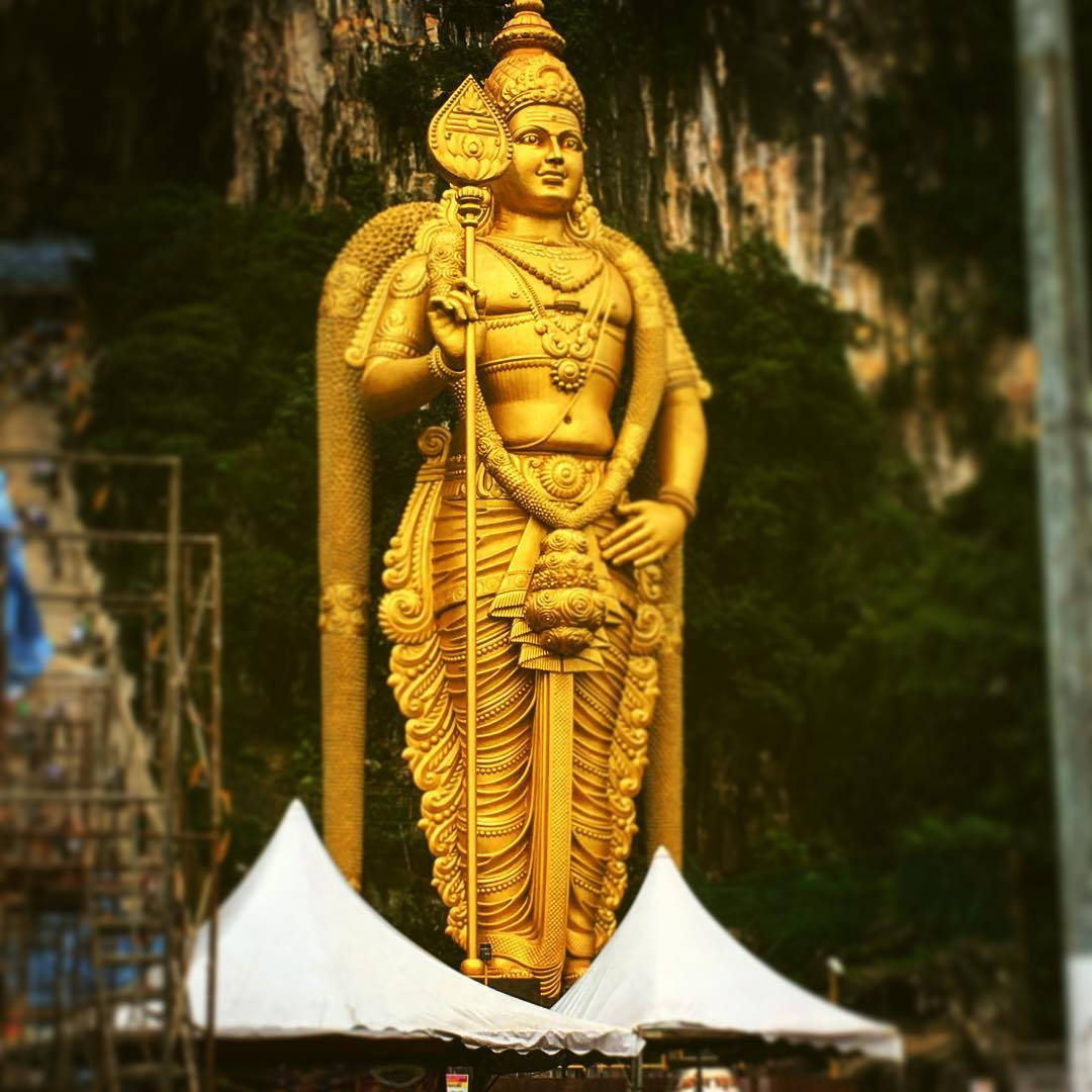Murugan Statue With White Tents Background