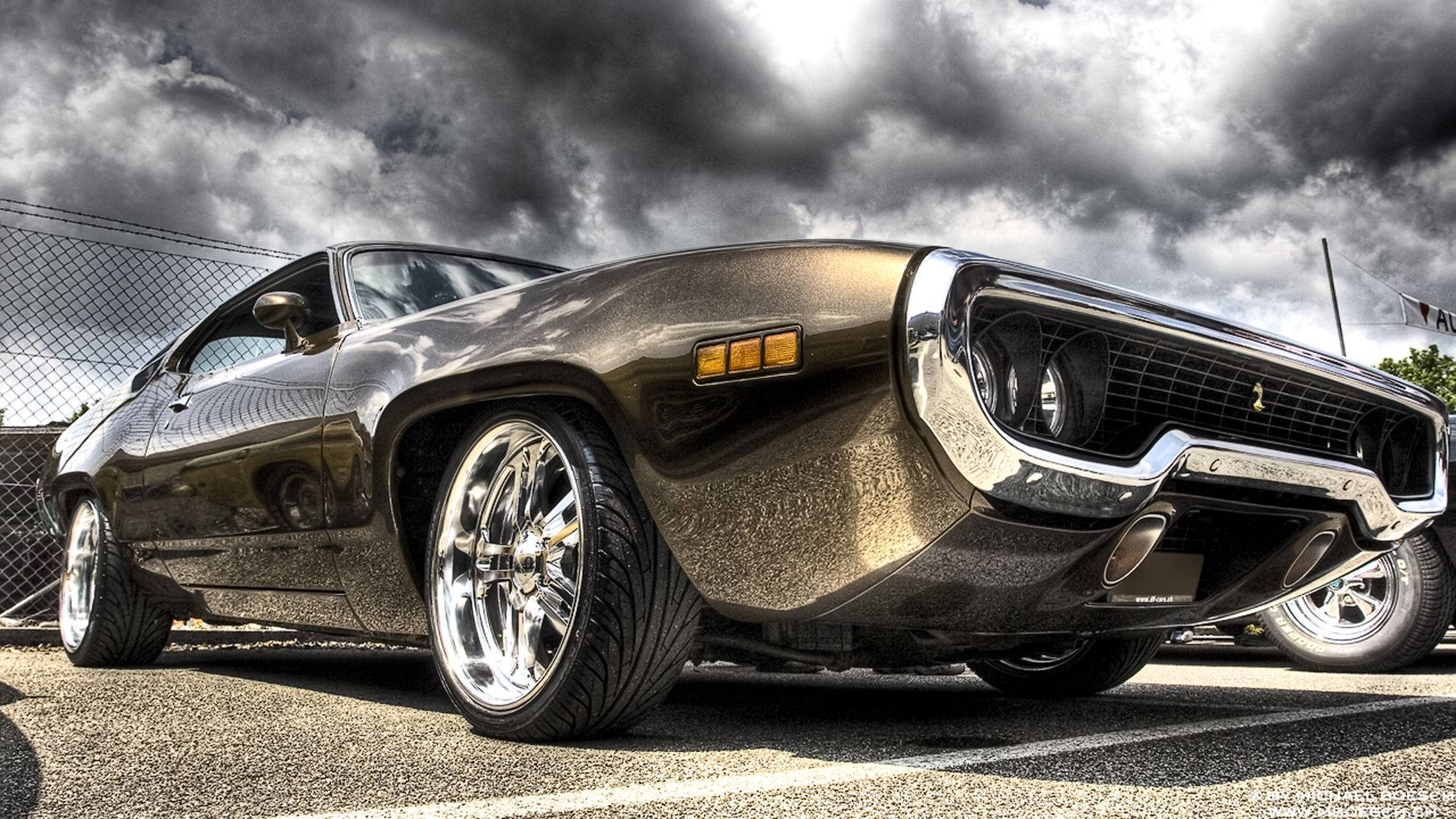 Muscle Car Under Gray Clouds Background