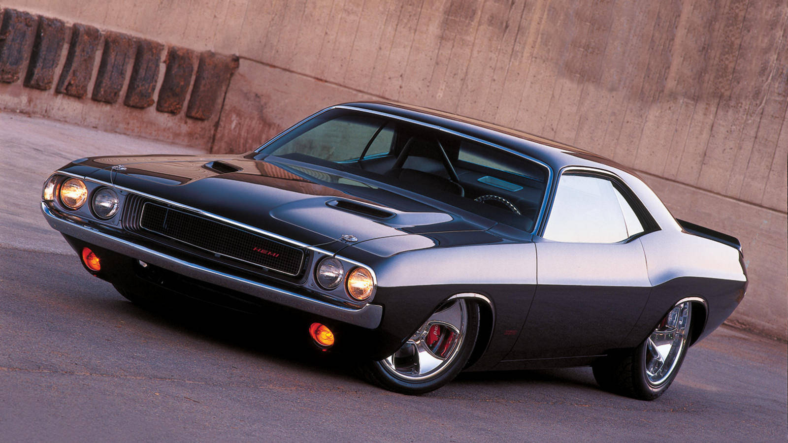 Muscle Car With Headlights On Background