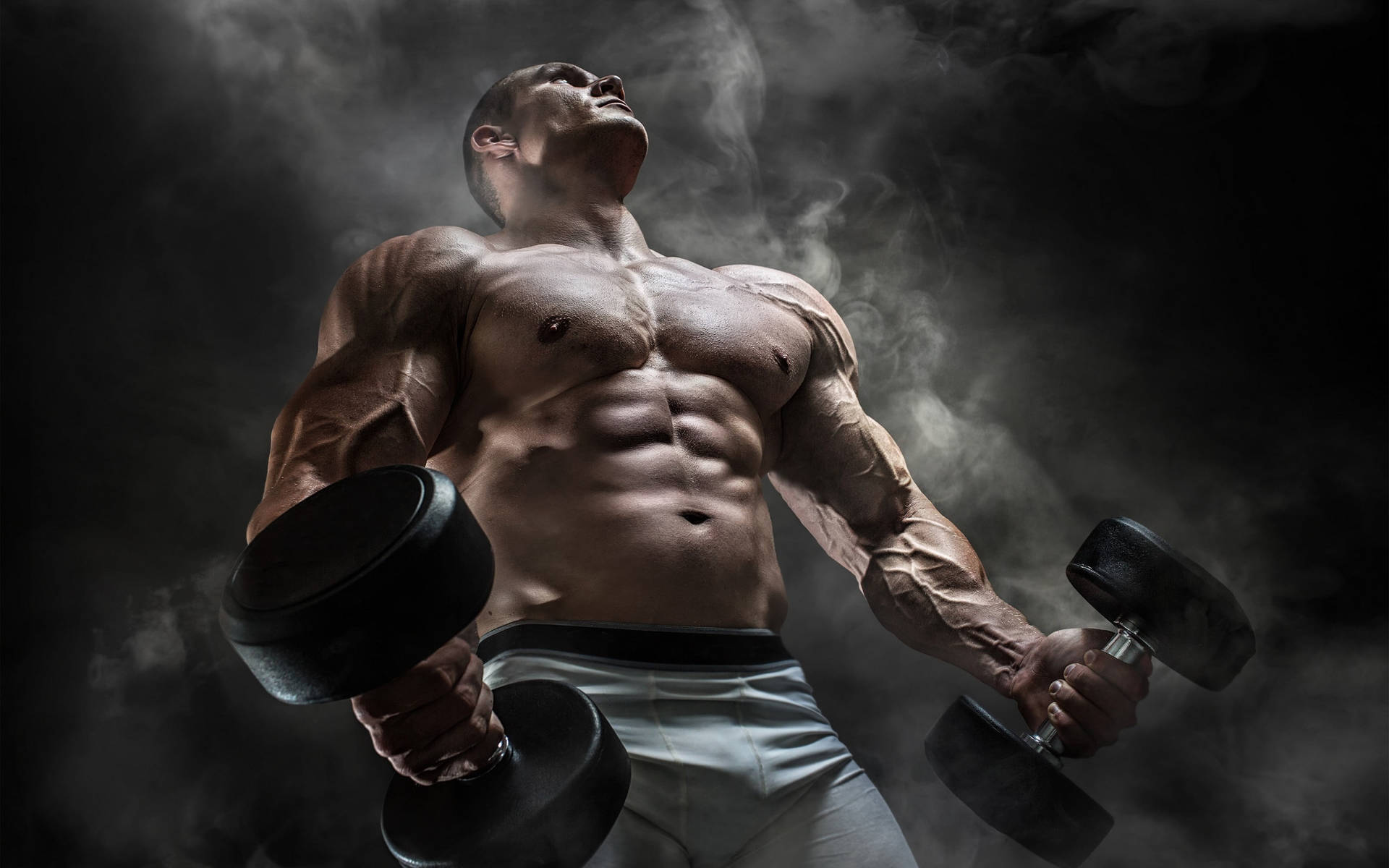 Muscle Man Holding Dumbbells Background