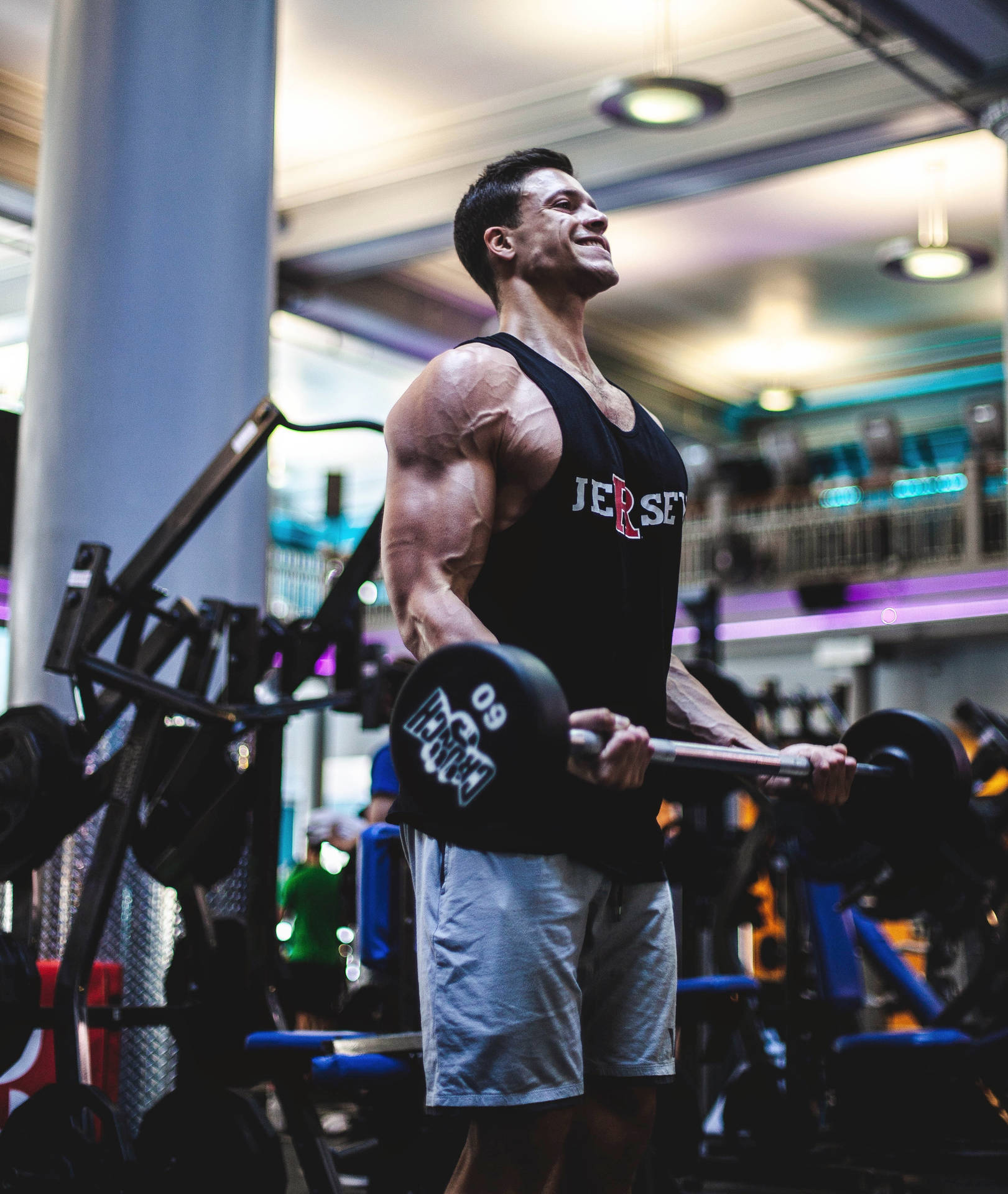 Muscular Man In Gym Background