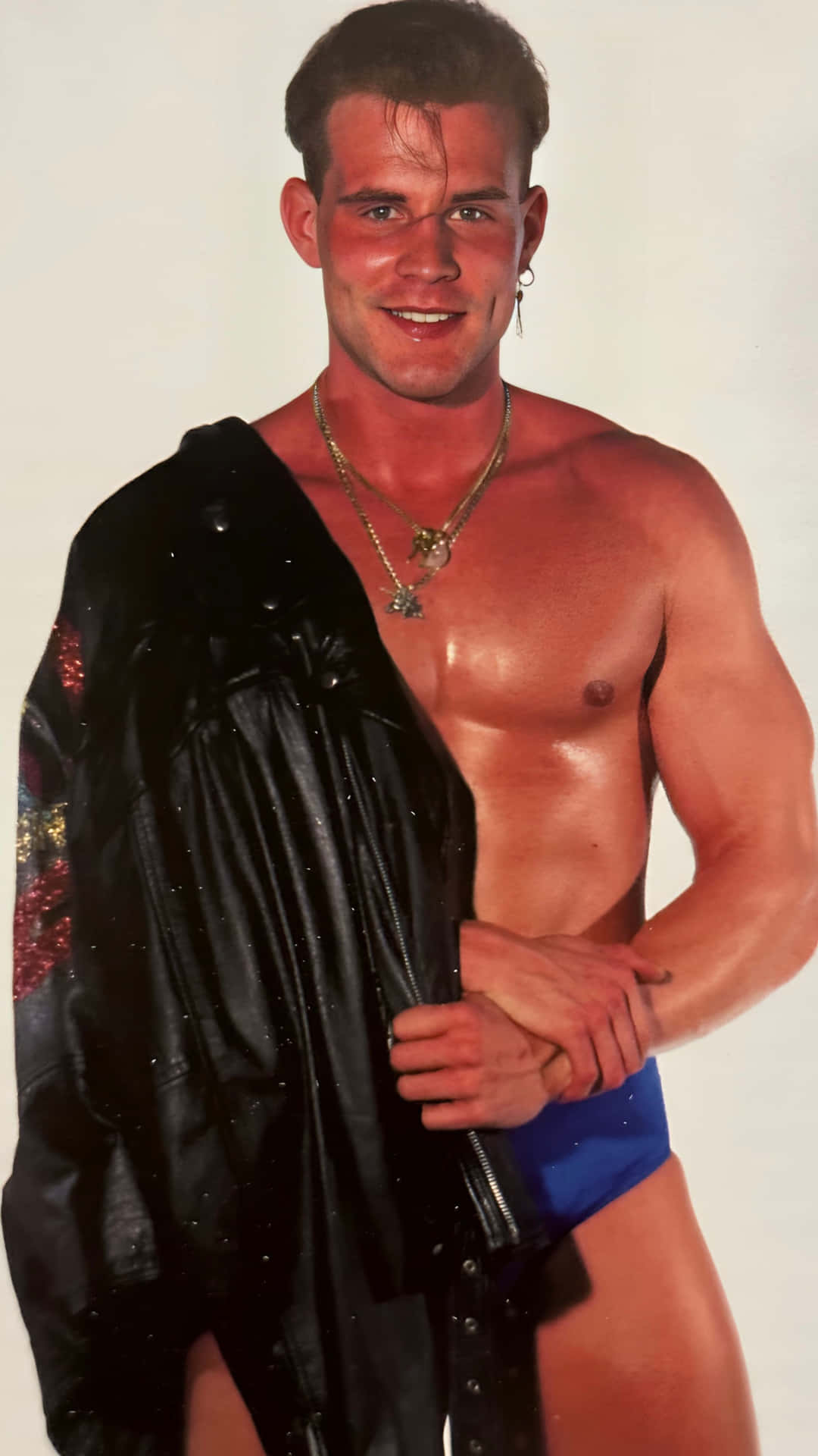 Muscular Manwith Black Jacket Background