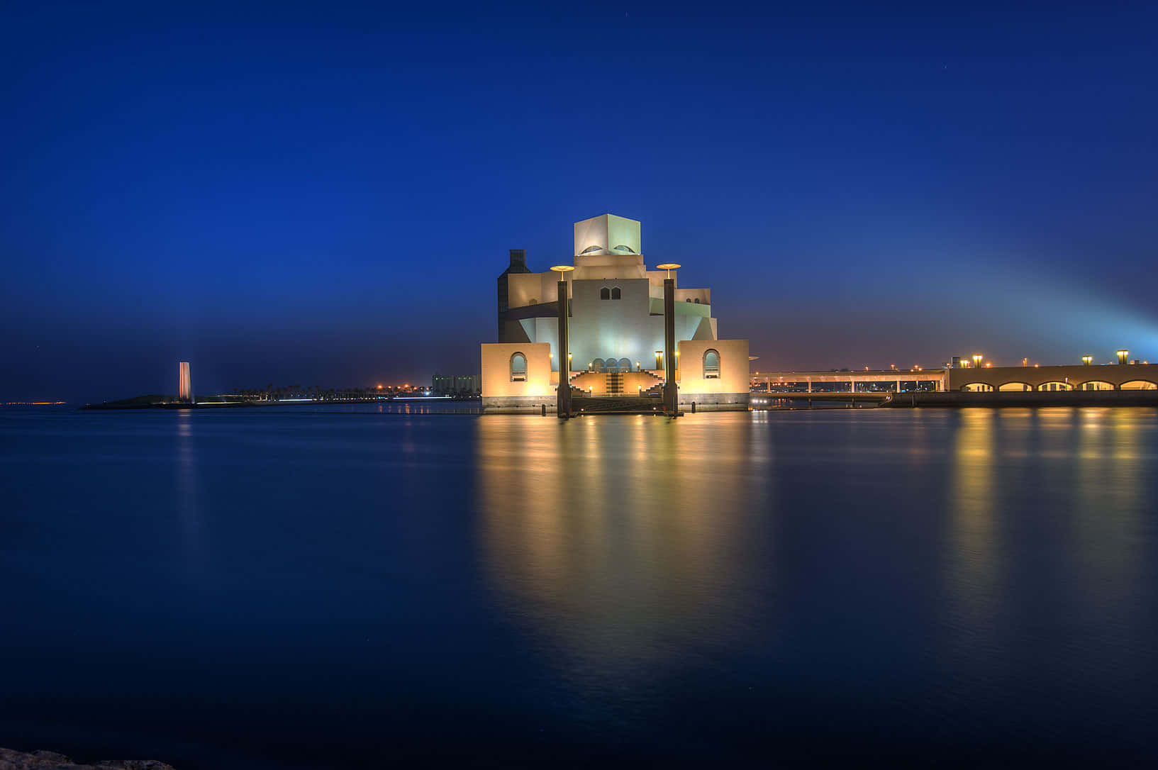Museum Of Islamic Art Reflected In Evening Ocean Background