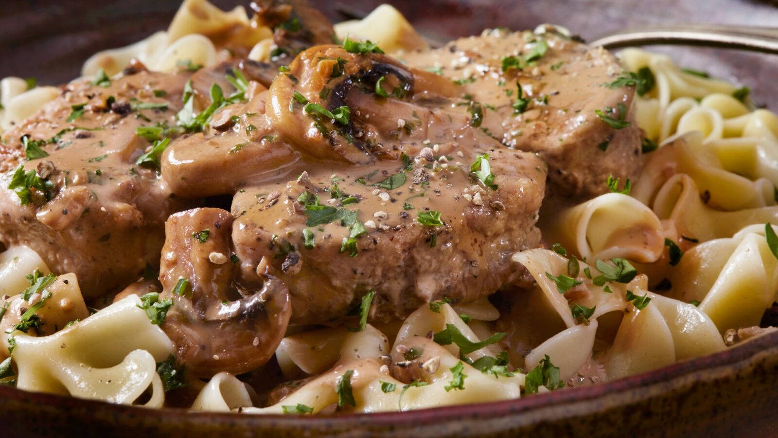 Mushrooms And Pasta With Beef Stroganoff Background