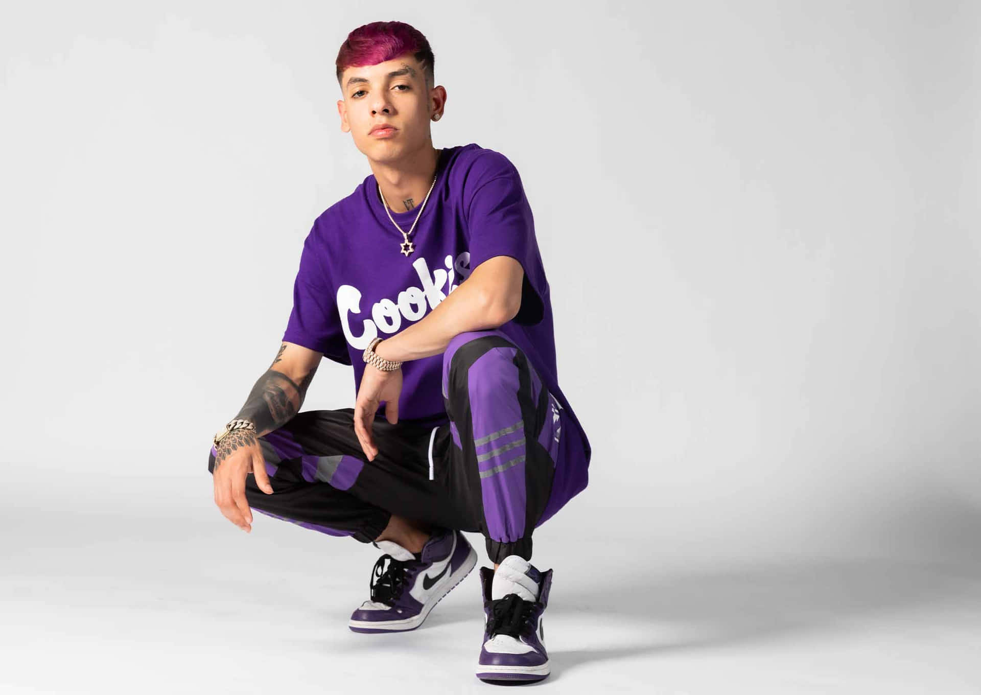 Music Artist Natanael Cano In An Urban Los Angeles Setting Background