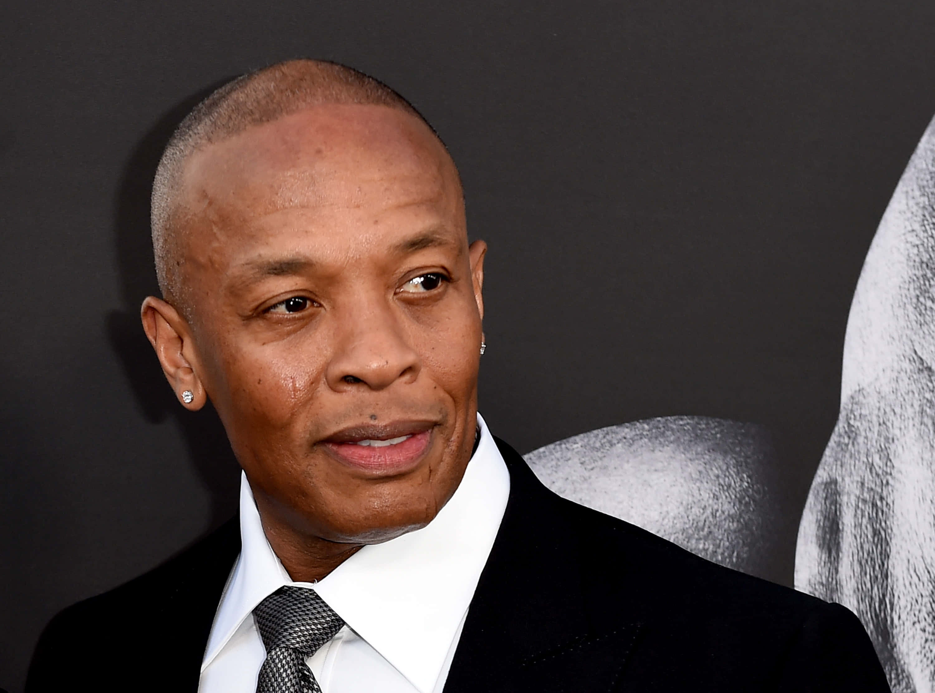 Music Maestro At Work - Dr. Dre Behind The Soundboard In His Recording Studio