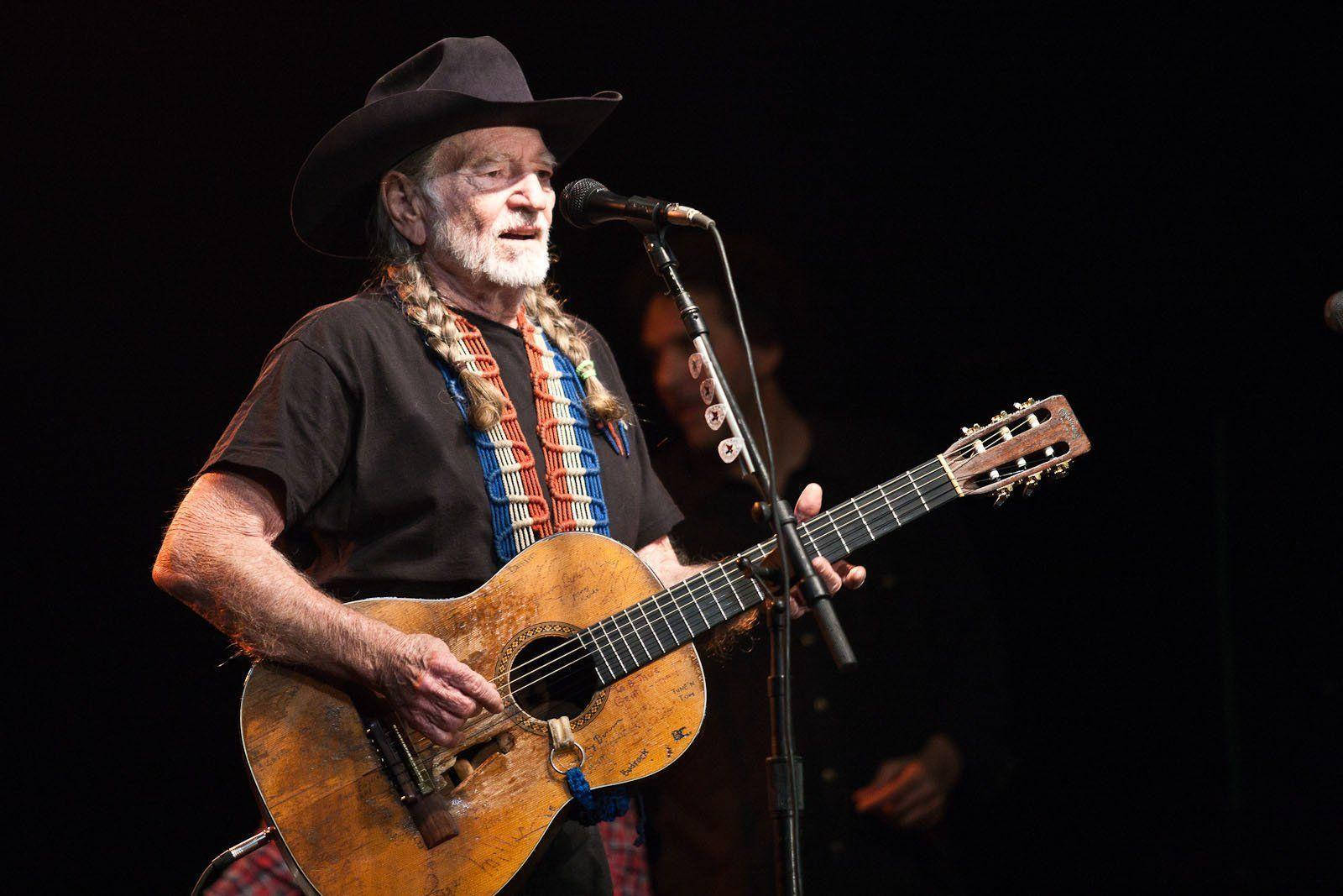 Musician Willie Nelson With Guitar