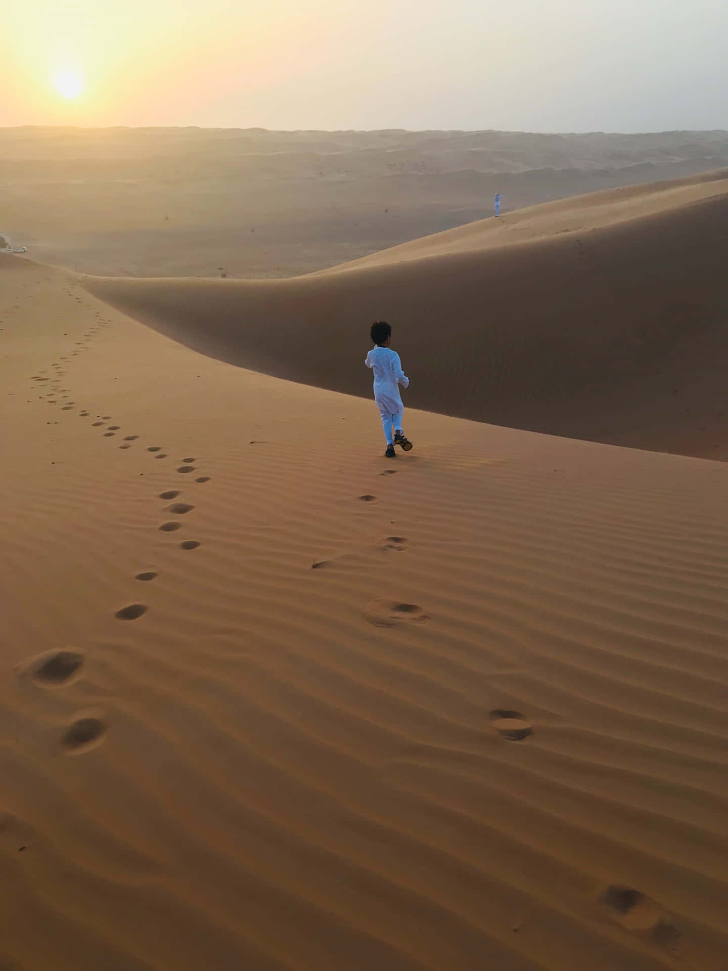 Muslim Boy In The Desert Background