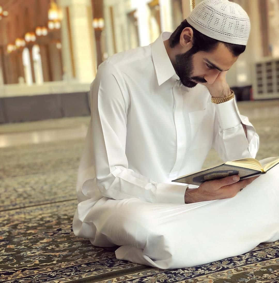 Muslim Boy Reading Quran Book Background