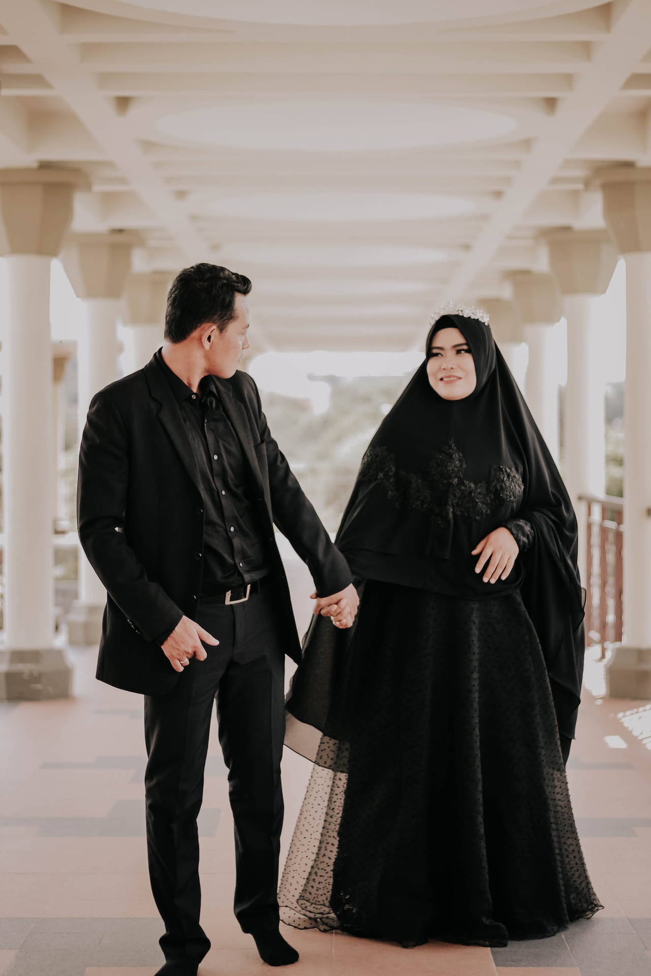 Muslim Couple Holding Hands