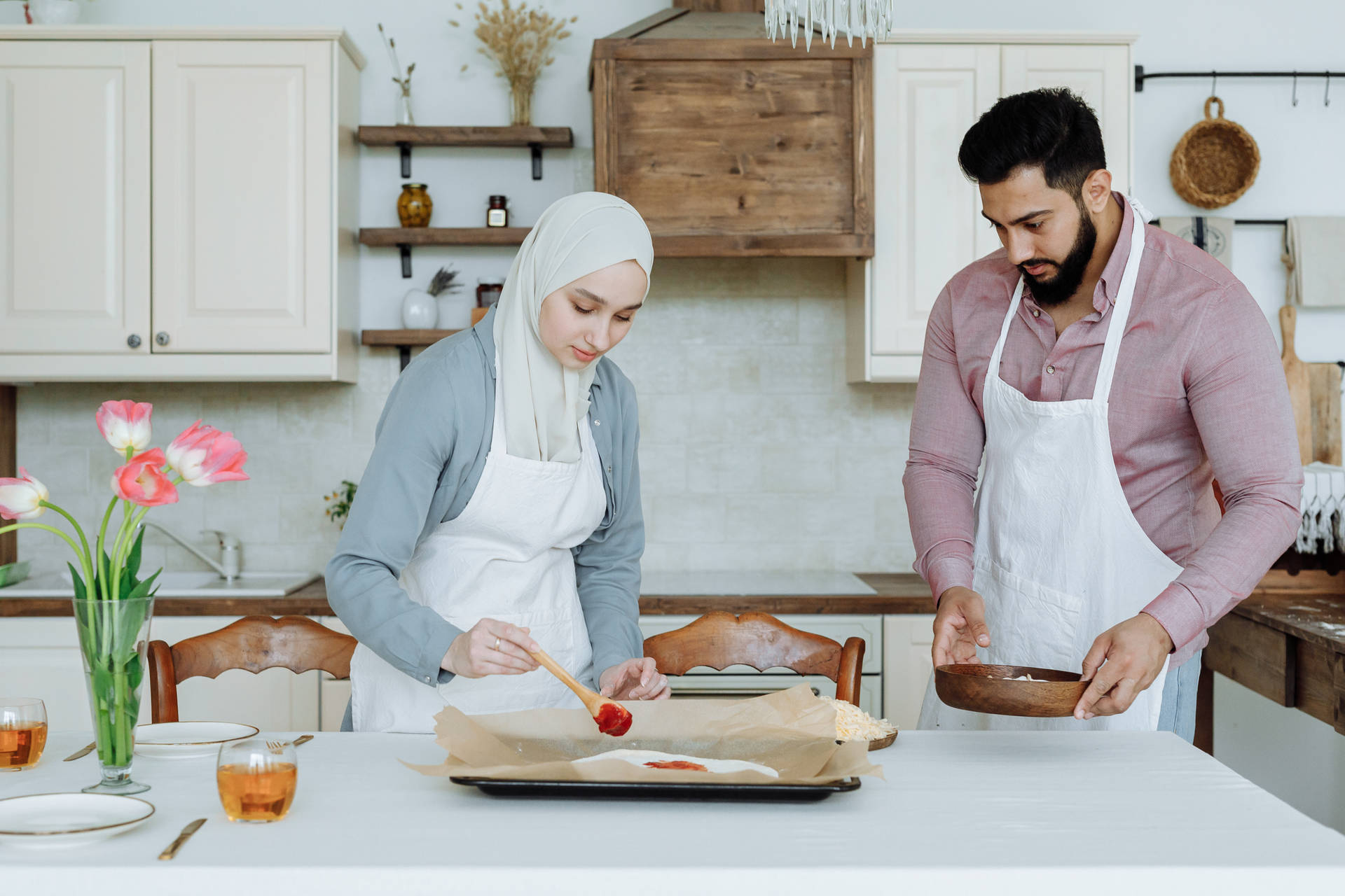 Muslim Couple In Kitchen Background