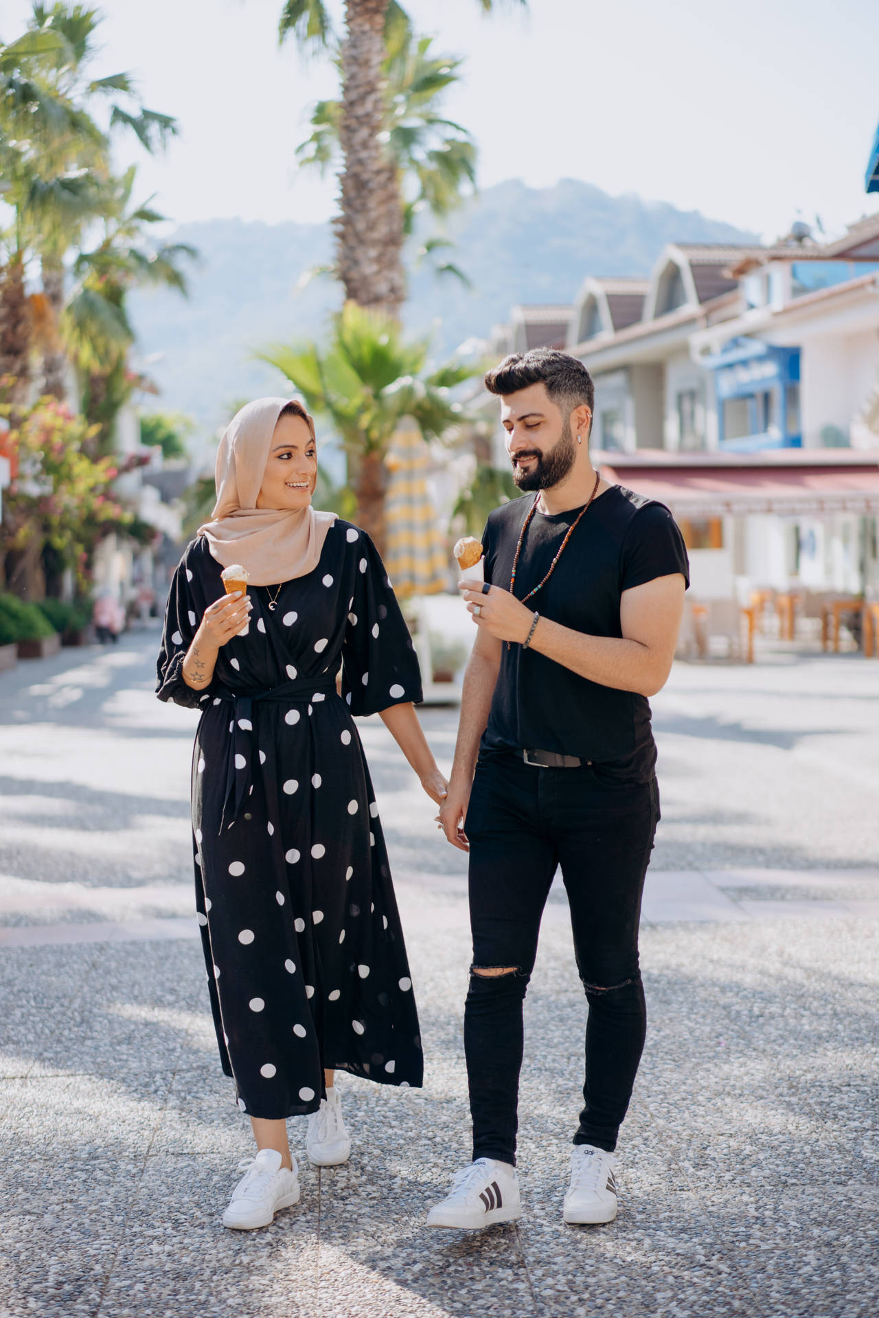 Muslim Couple With Ice Cream Background