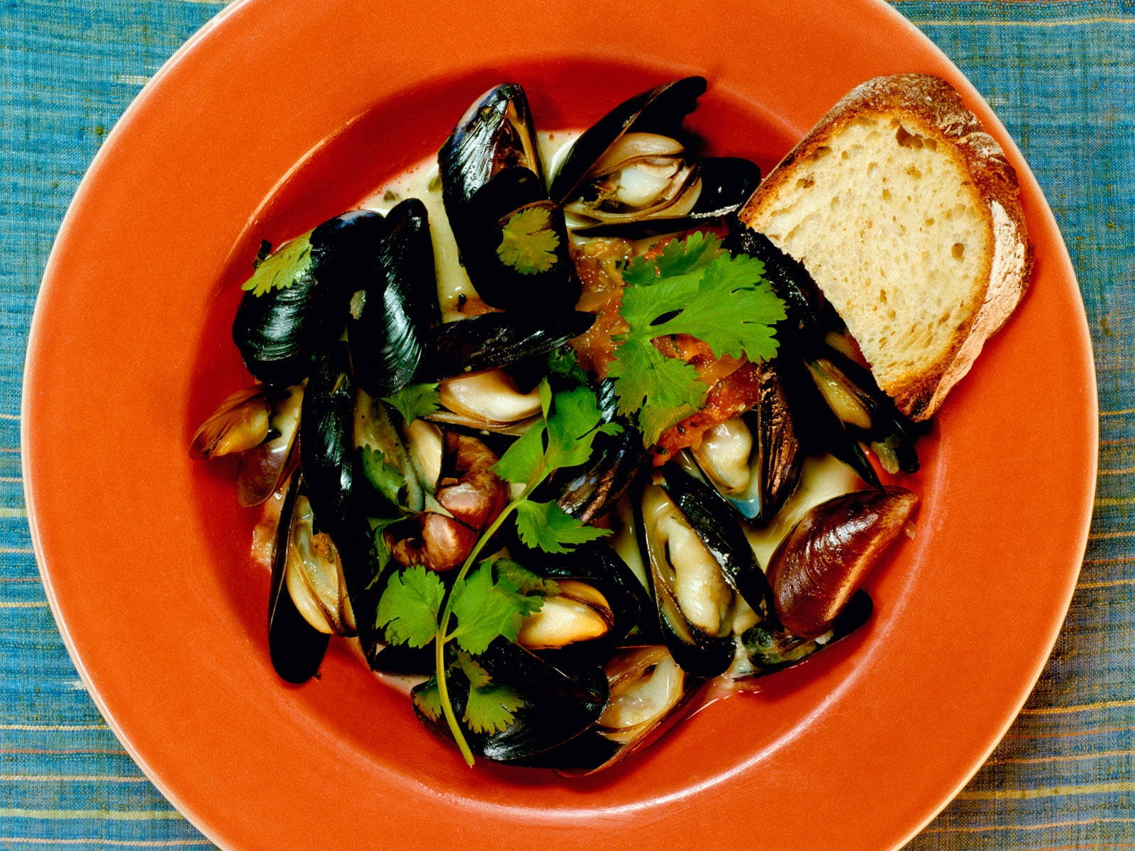 Mussels And Tomatoes With Celery Dish Background