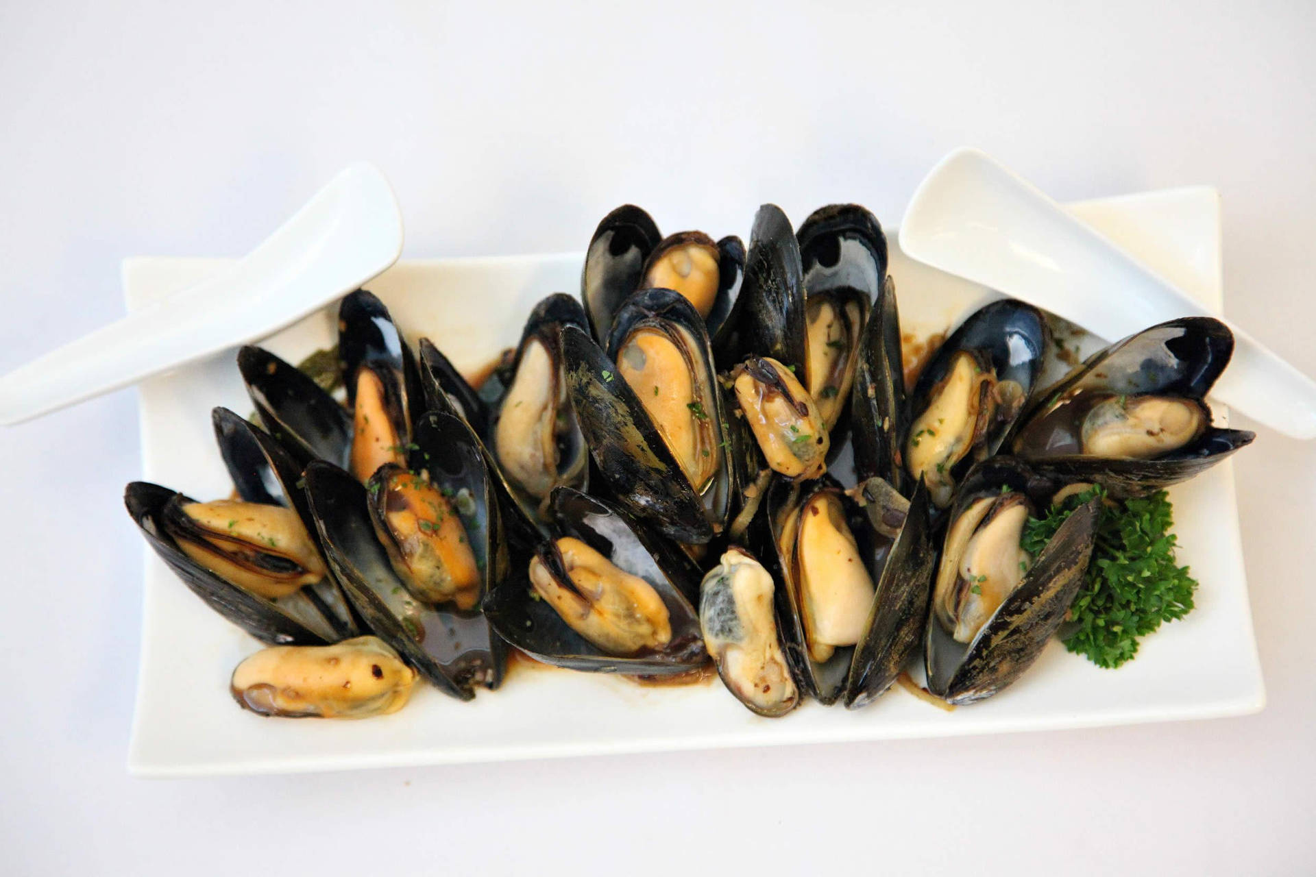 Mussels Served On White Rectangular Plate Background