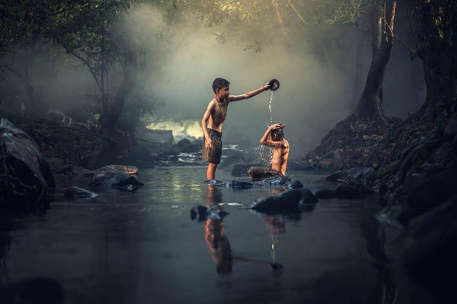 Myanmar Kid In River Background