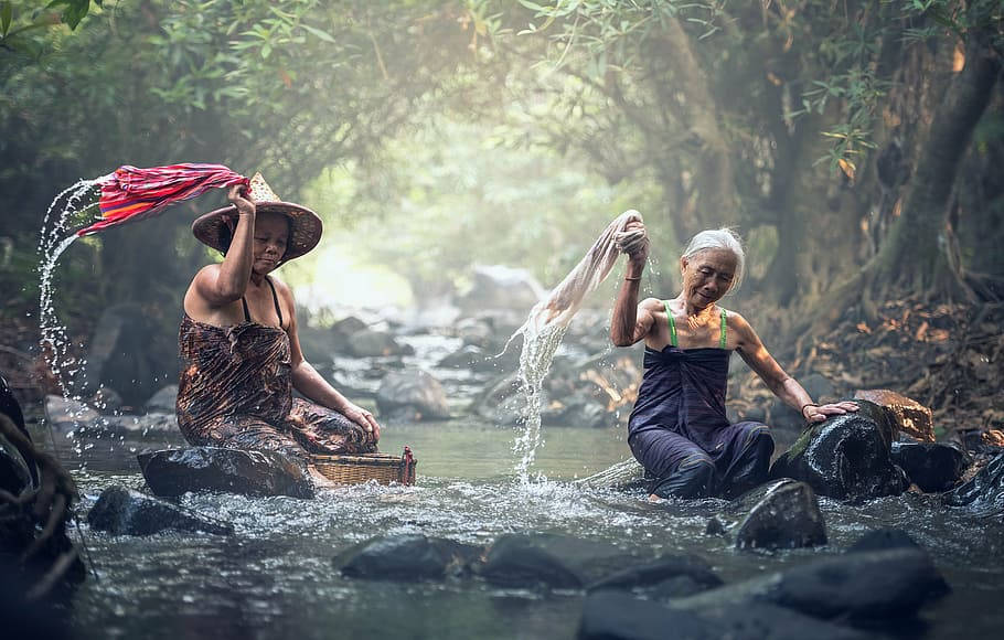 Myanmar Ladies On Lake Background