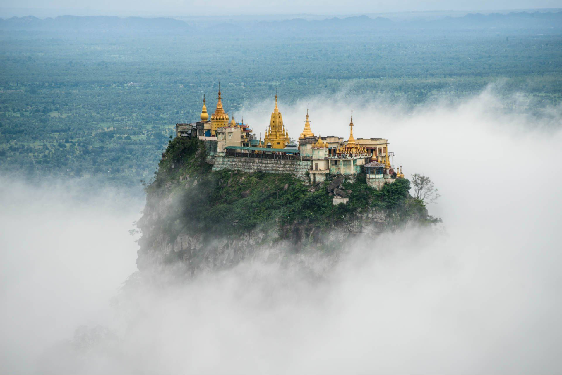 Myanmar Temple On Mountain Peak Background