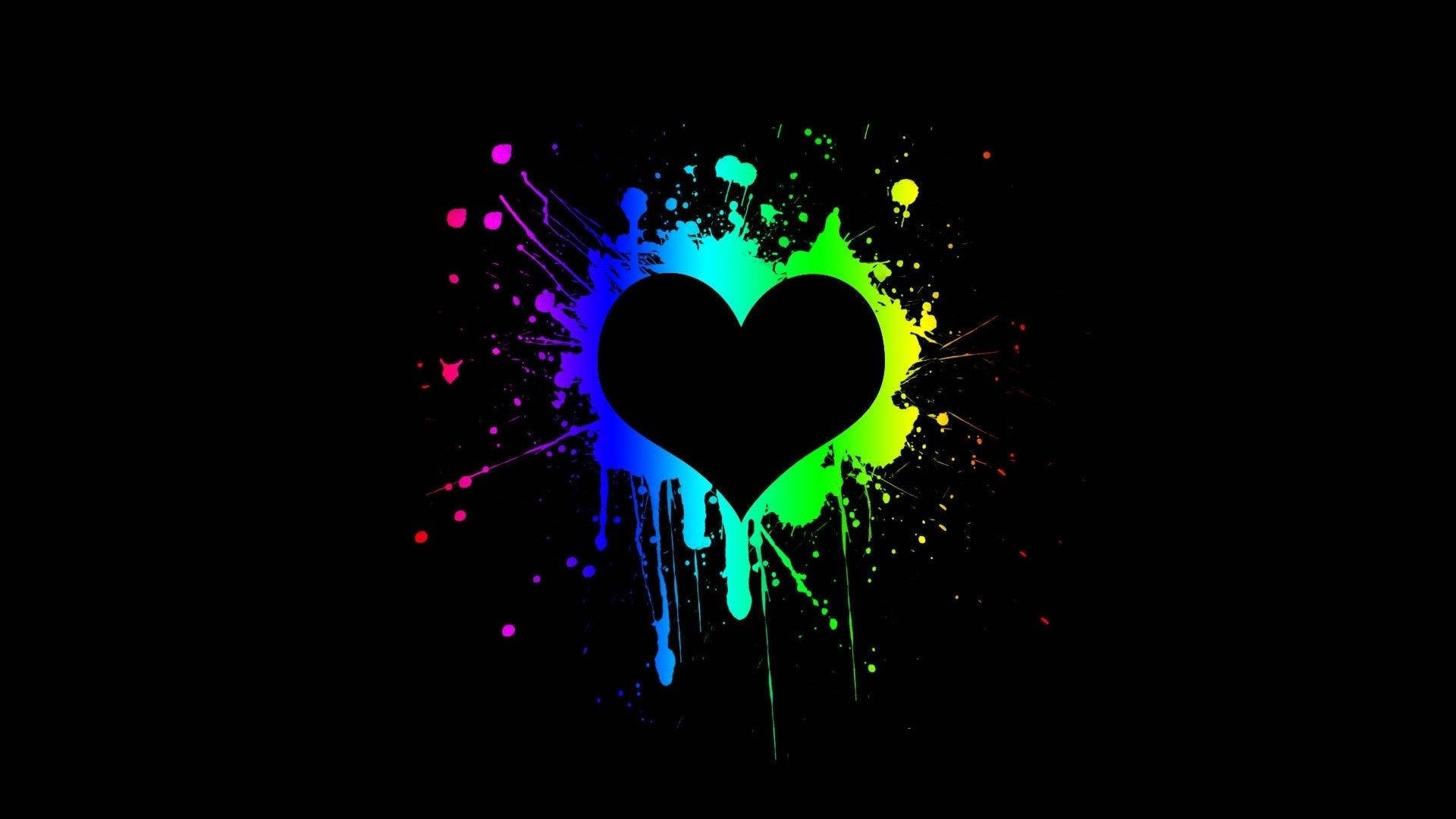 Mysterious Black Heart Imprinted With Paint Splashes Background