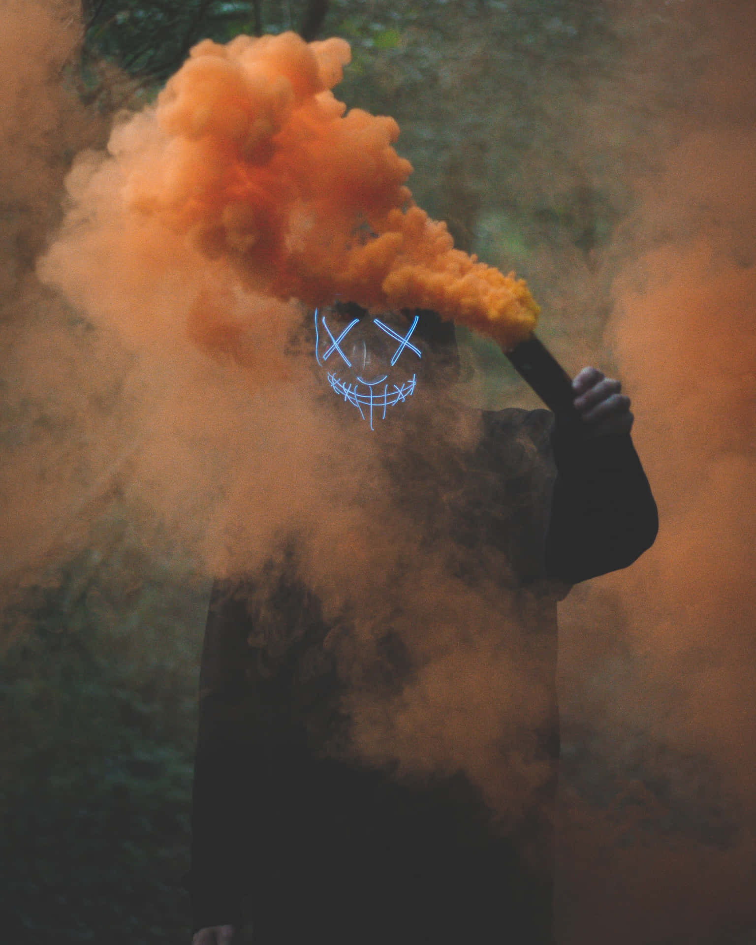 Mysterious_ Figure_ With_ Orange_ Smoke Background