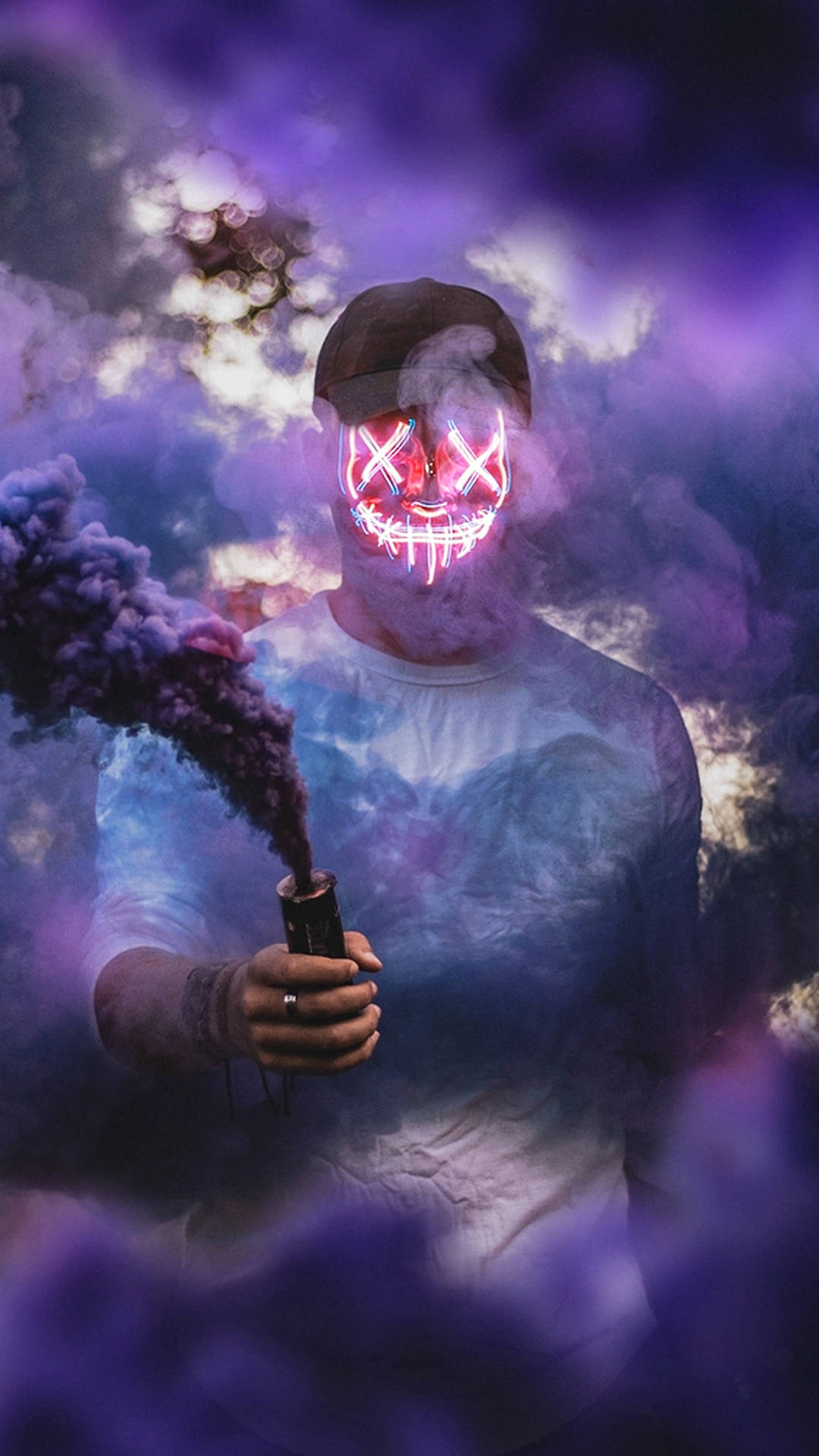 Mysterious Purge Mask Emerges Through Smoke Background