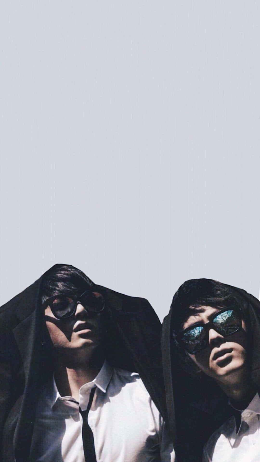 Mysterious_ Twins_with_ Sunglasses Background