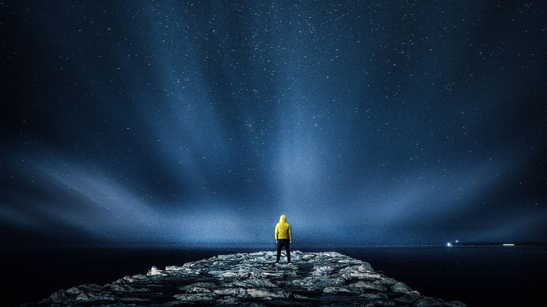 Mystery Man Wearing Hoodie On Winter Sky Background