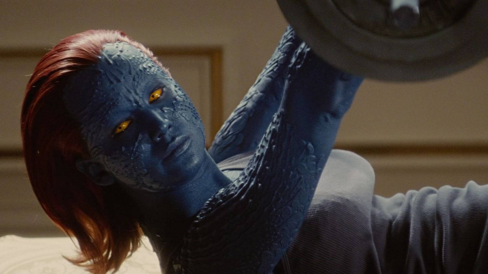 Mystique Lifting A Dumbbell