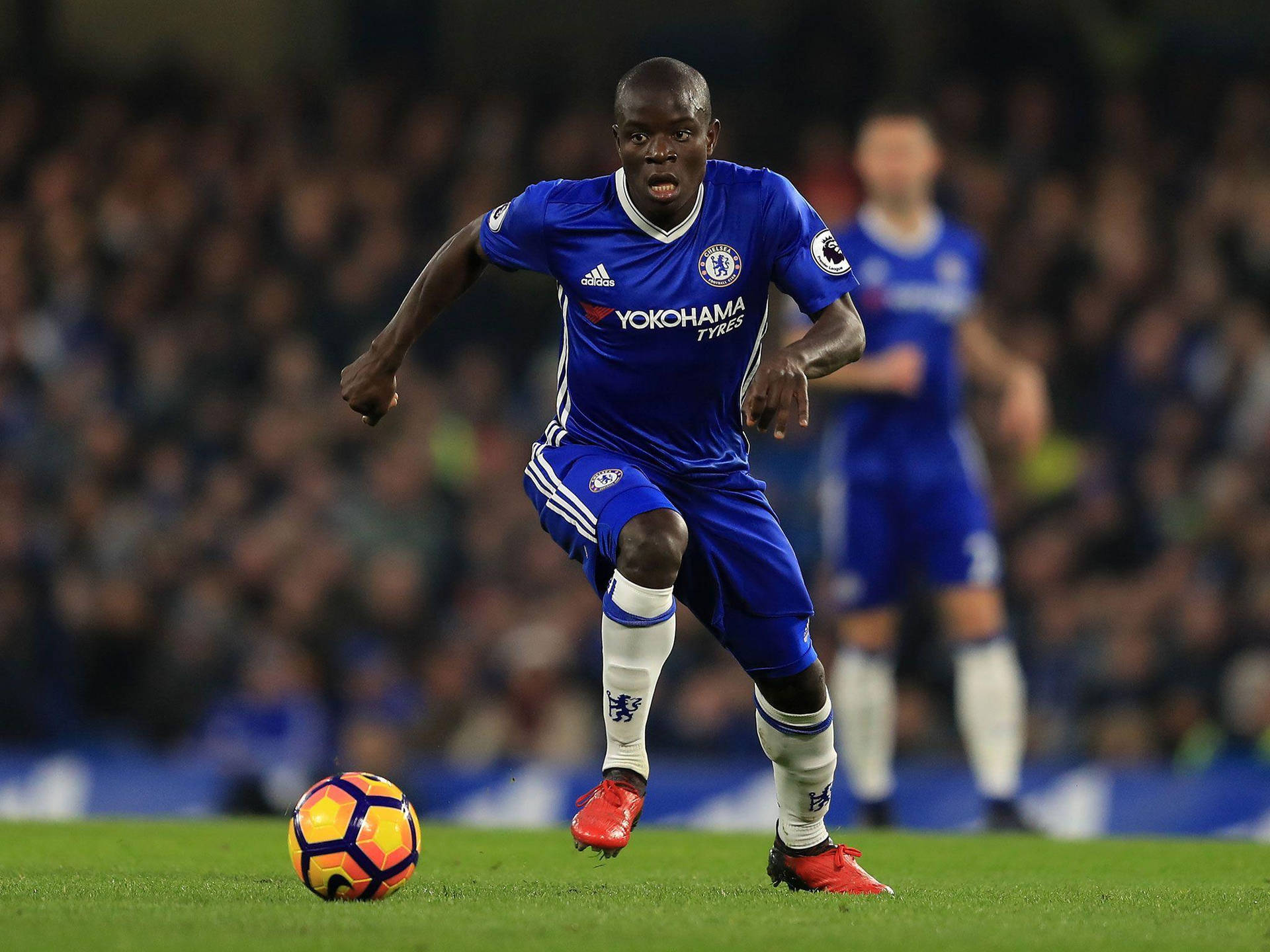 N'golo Kante Running For The Ball Background