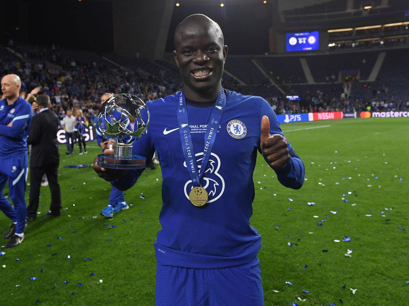 N'golo Kante With Trophy And Medal Background