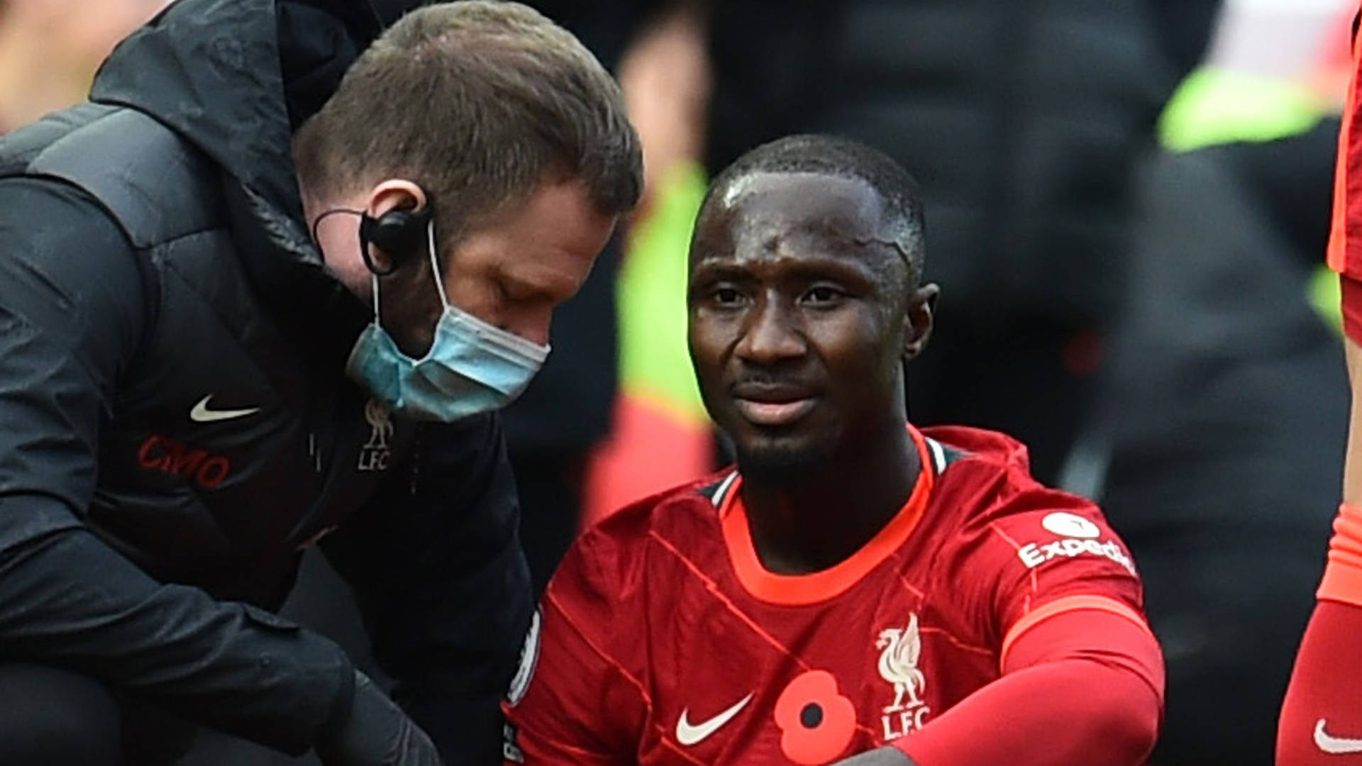 Naby Keita Being Comforted Background