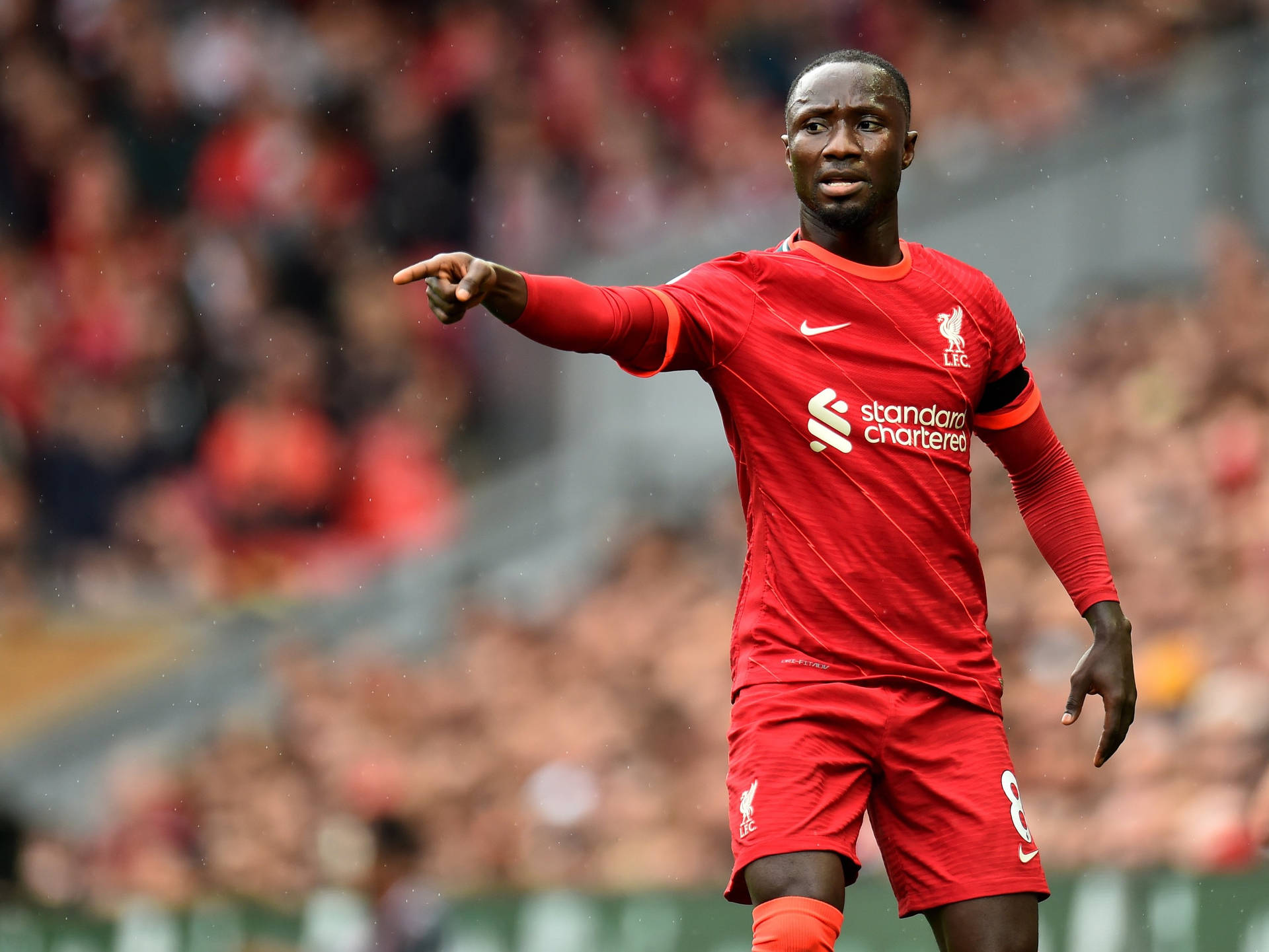 Naby Keita Pointing Background